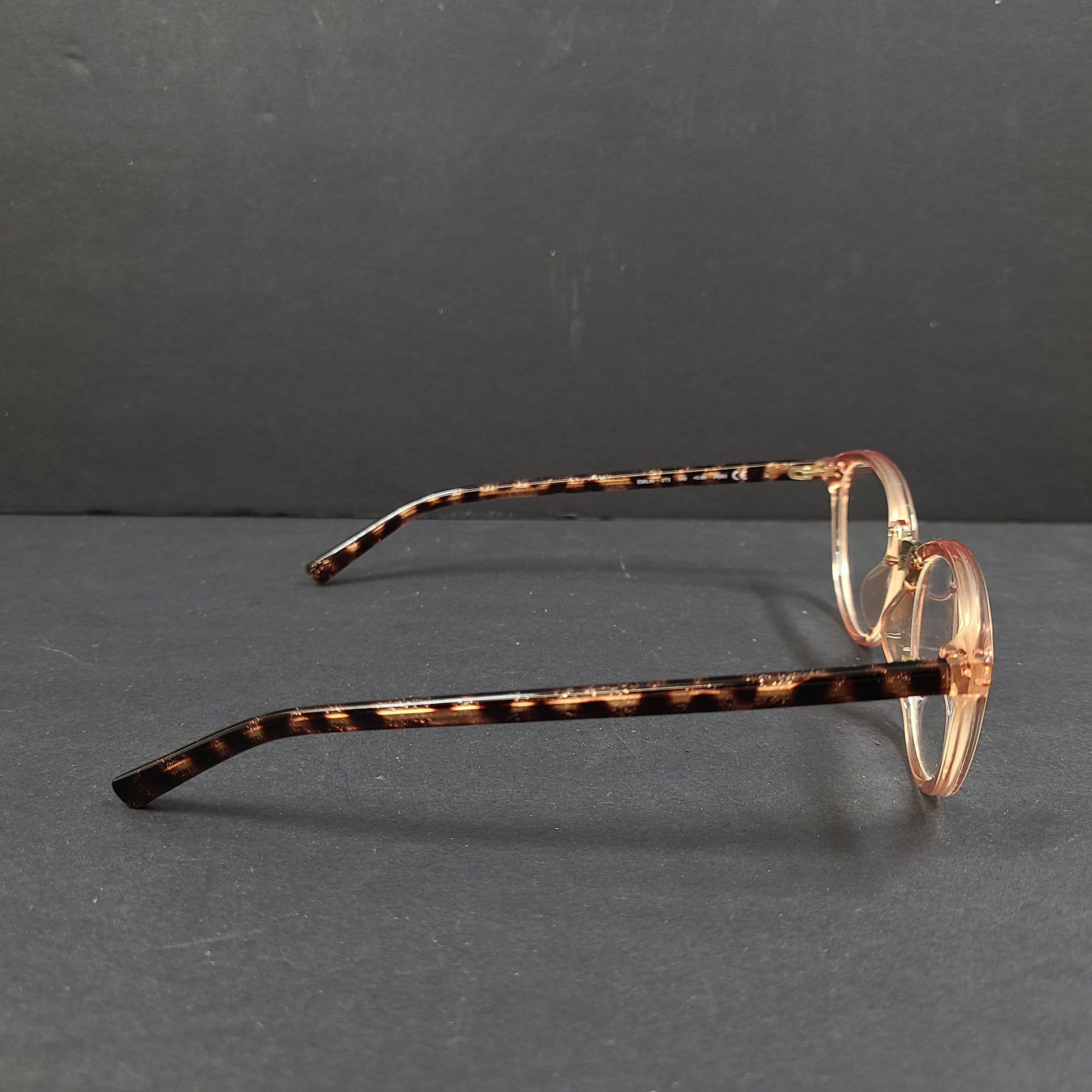 Kate Spade Emilia eyeglasses 2T3 140 in tortoise and peach with a branded arm inscription.