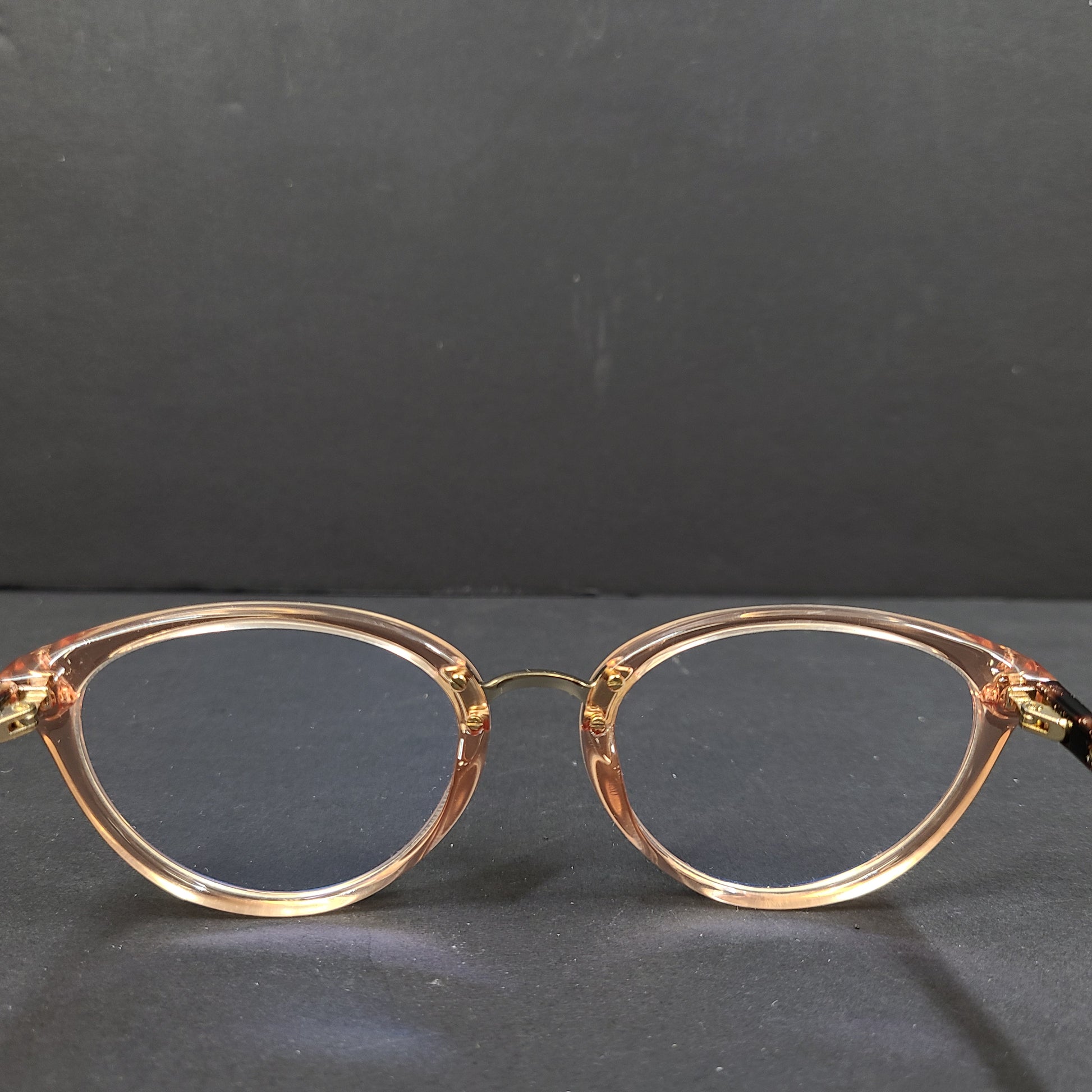 Kate Spade Emilia eyeglasses 2T3 140 in tortoise and peach with a branded arm inscription.