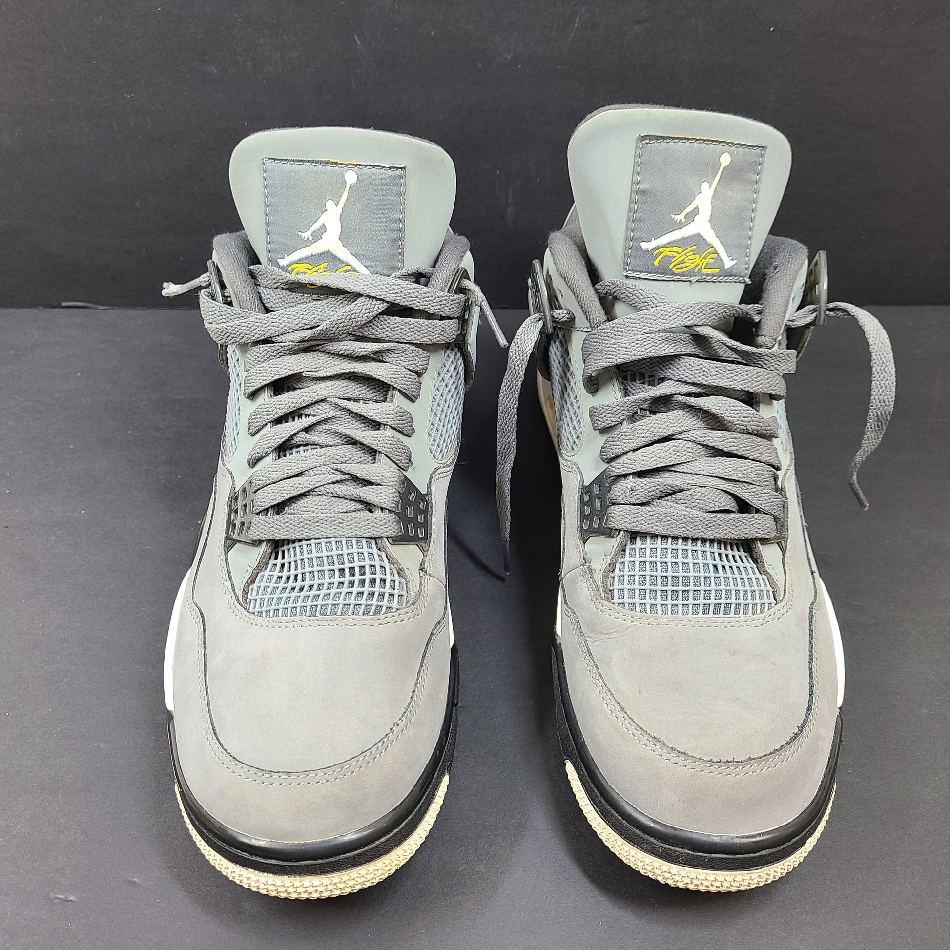 Nike Air Jordan 4 Retro Cool Grey sneakers in US size 12 with grey upper and signature midsole.