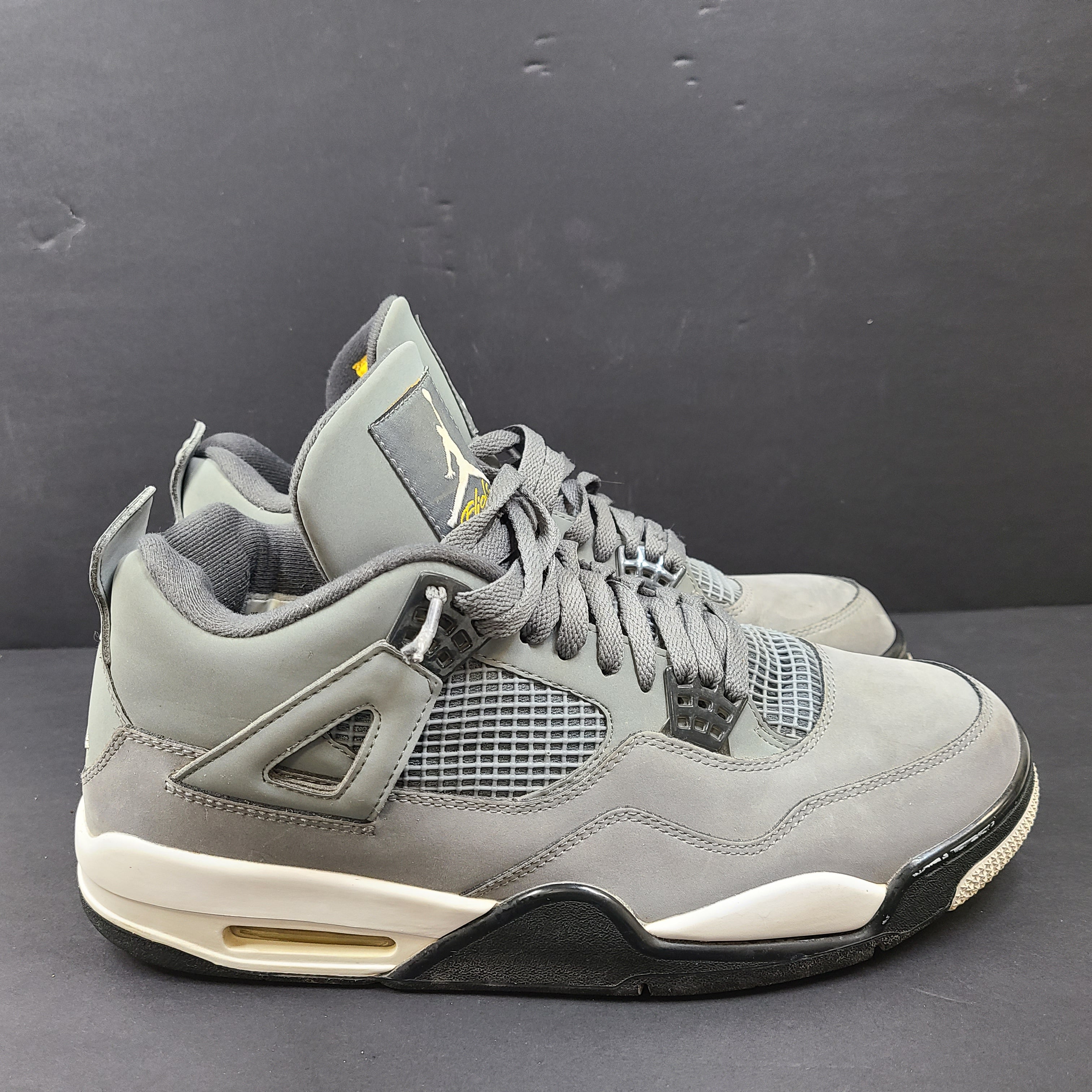 Nike Air Jordan 4 Retro Cool Grey sneakers in US size 12 with grey upper and signature midsole.