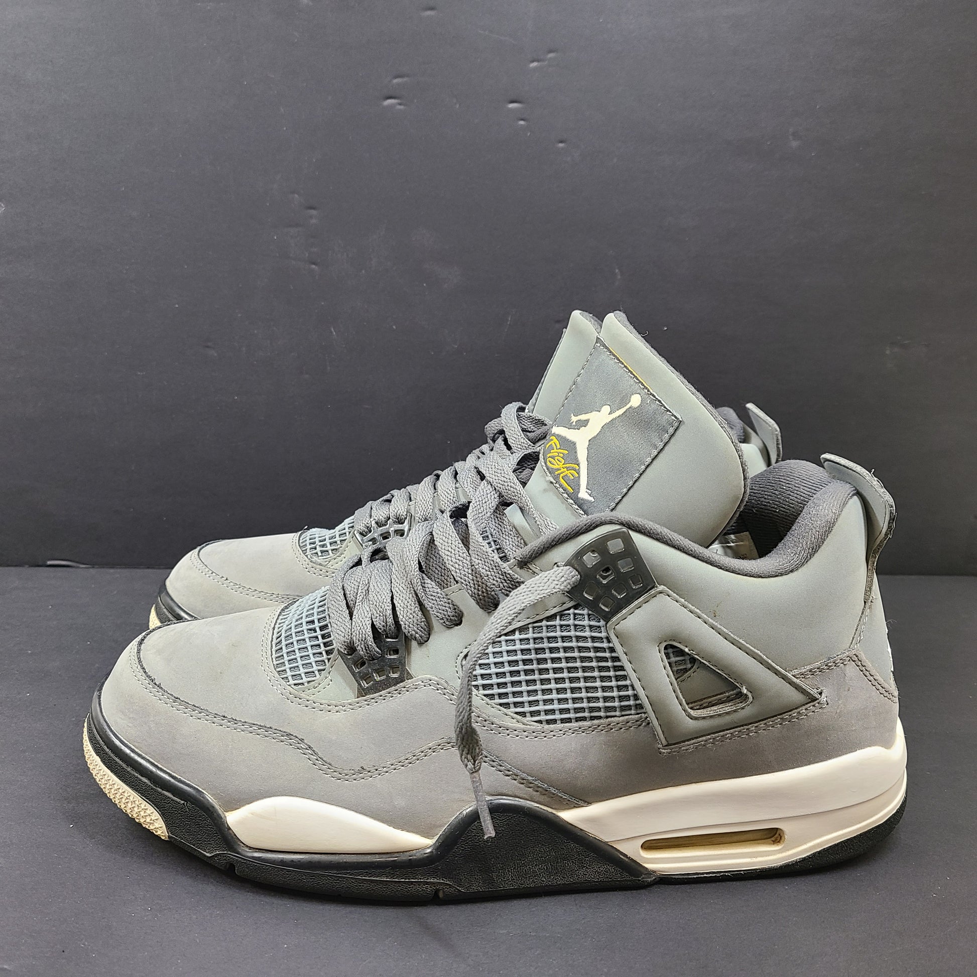 Nike Air Jordan 4 Retro Cool Grey sneakers in US size 12 with grey upper and signature midsole.