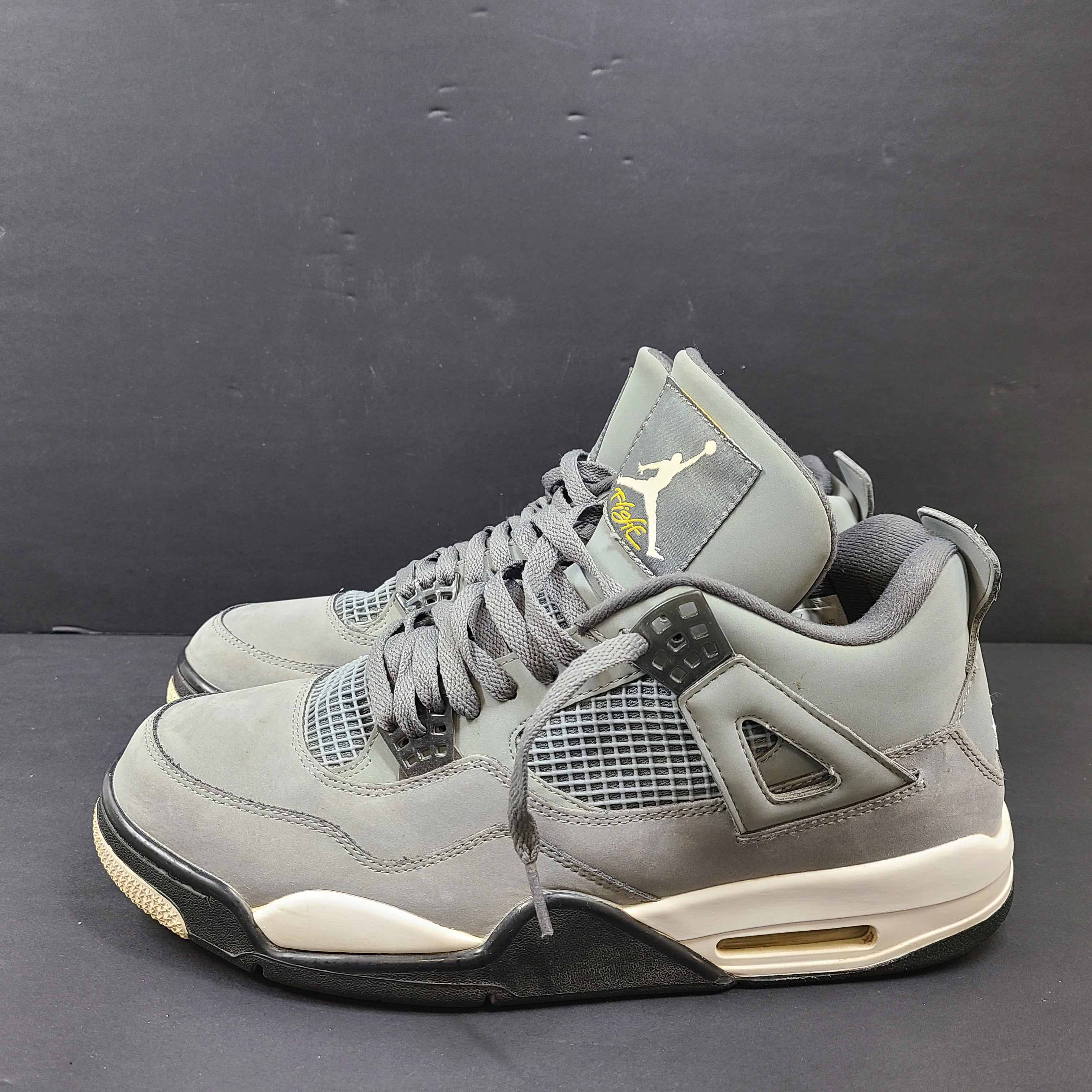 Nike Air Jordan 4 Retro Cool Grey sneakers in US size 12 with grey upper and signature midsole.