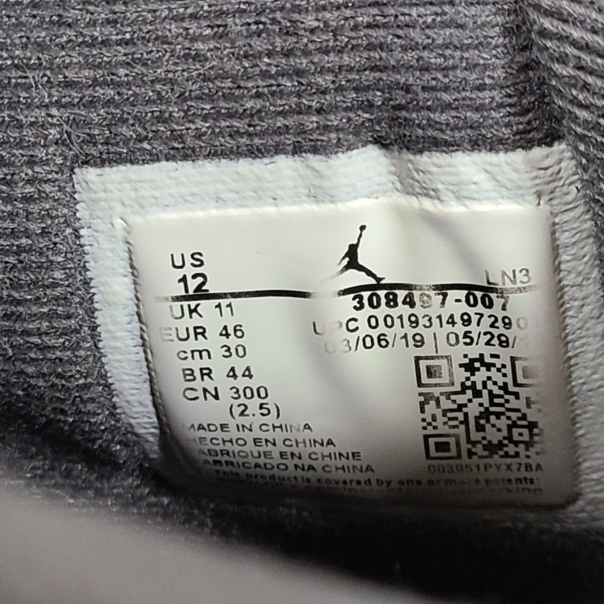 Nike Air Jordan 4 Retro Cool Grey sneakers in US size 12 with grey upper and signature midsole.