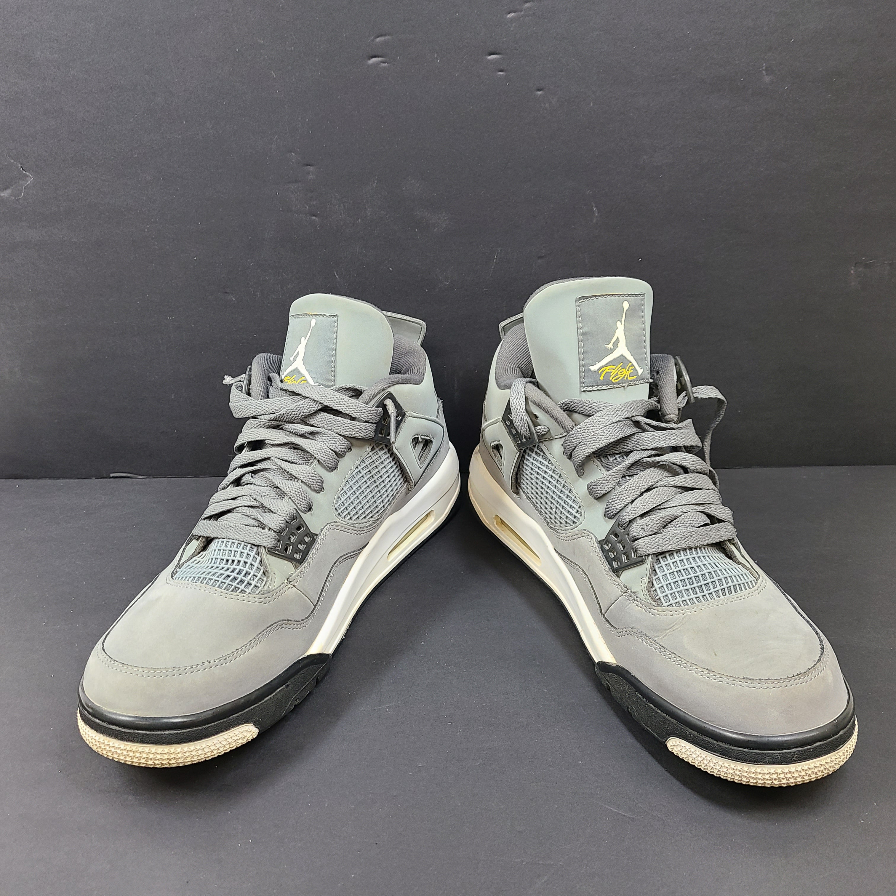 Nike Air Jordan 4 Retro Cool Grey sneakers in US size 12 with grey upper and signature midsole.