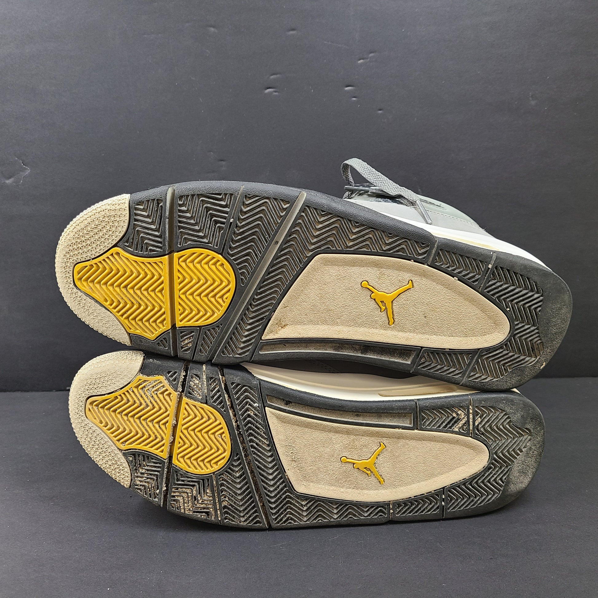 Nike Air Jordan 4 Retro Cool Grey sneakers in US size 12 with grey upper and signature midsole.
