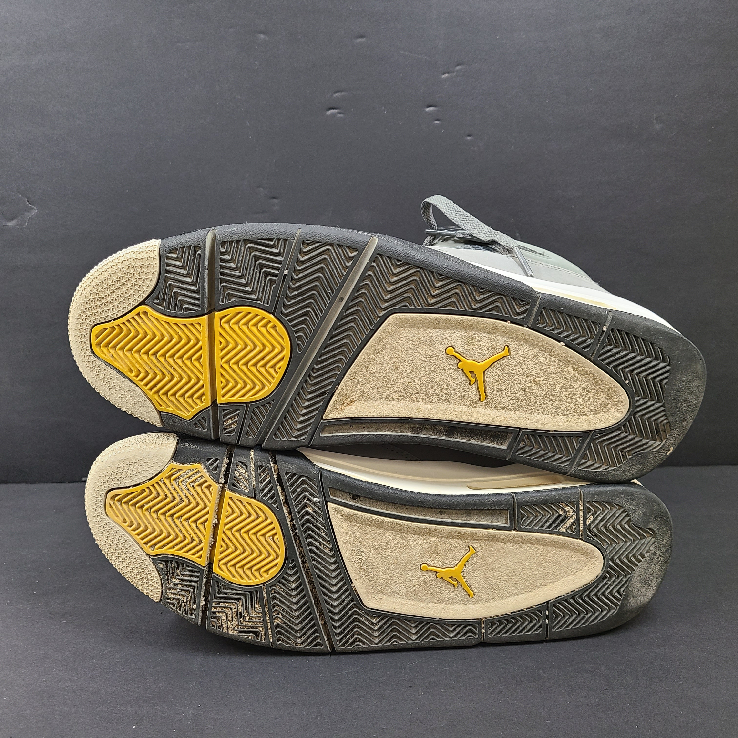 Nike Air Jordan 4 Retro Cool Grey sneakers in US size 12 with grey upper and signature midsole.