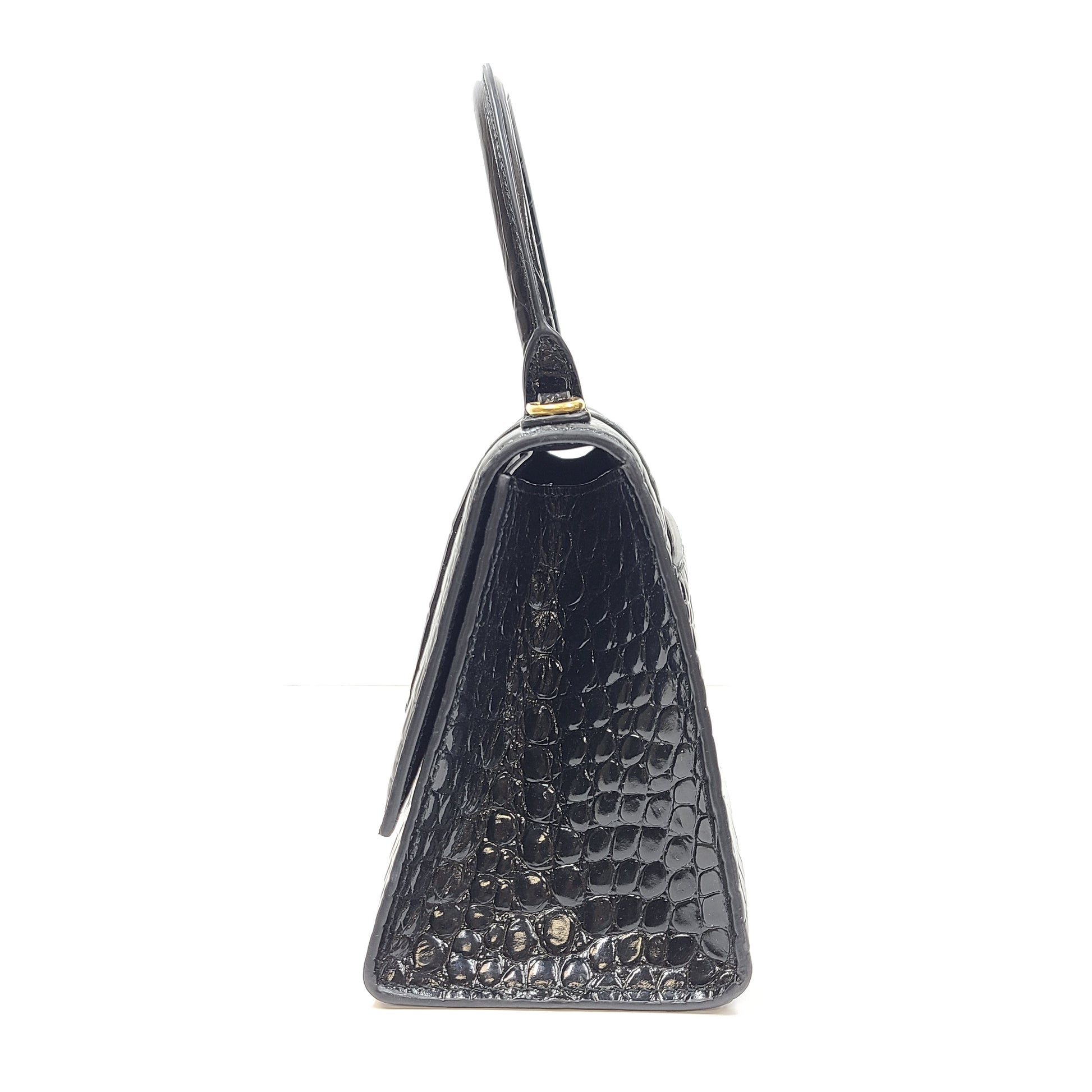 Balenciaga crocodile-embossed black leather handbag with branded buckle and detachable strap.