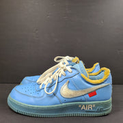 Nike Air Force 1 low-top sneakers in blue and yellow, size US 7, featuring "SHOELACES" text on the laces and "AIR" on the sole.