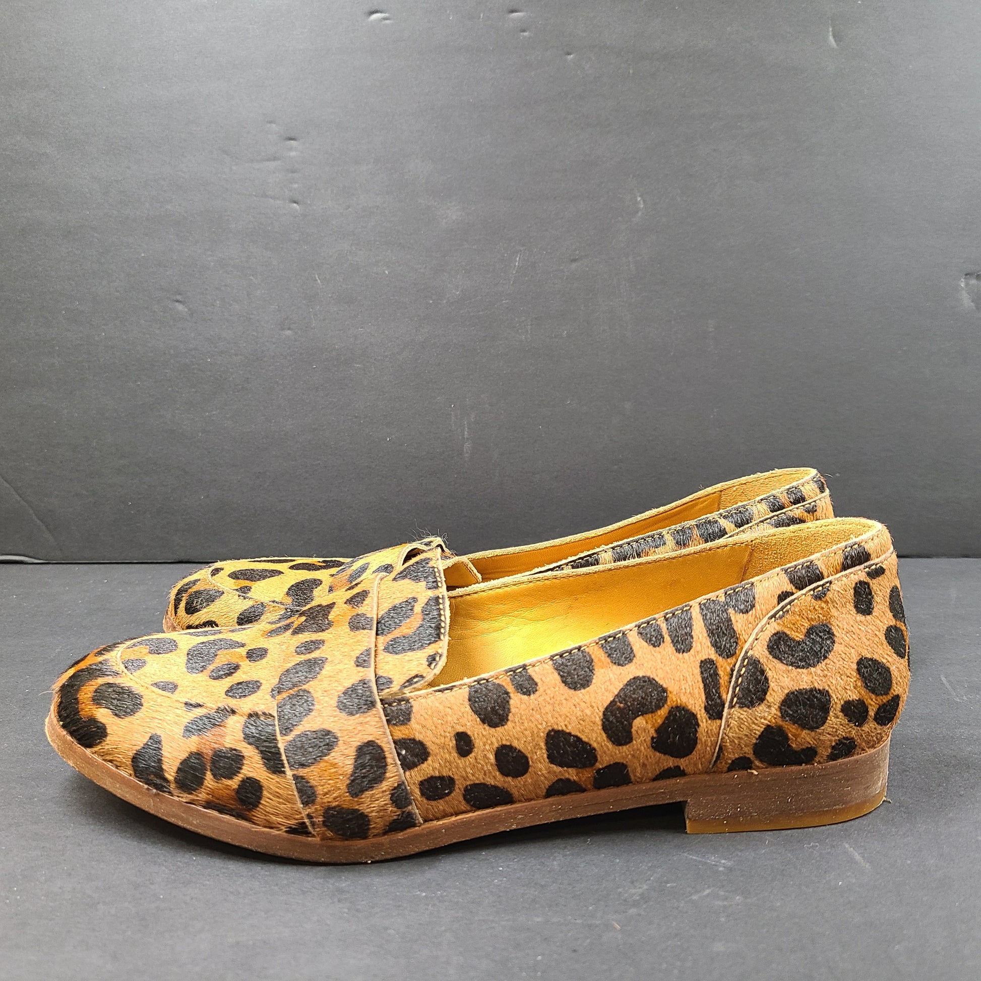 Leopard-print Sézane loafers feature a low profile, branded insole reading "SOULIERS SÉZANE" and a sole stamped "made in Portugal" and 39.