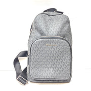 A grey Michael Kors backpack model 1239NHNP with leather finish and a structured silhouette.