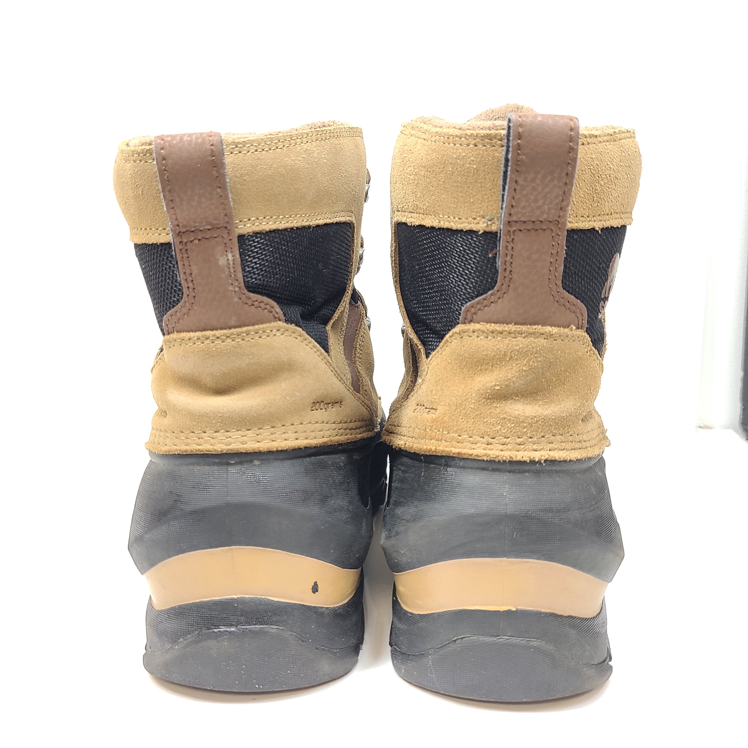 Brown Sorel men's waterproof faux-fur lined boots in US size 10 designed for wet and cold conditions.