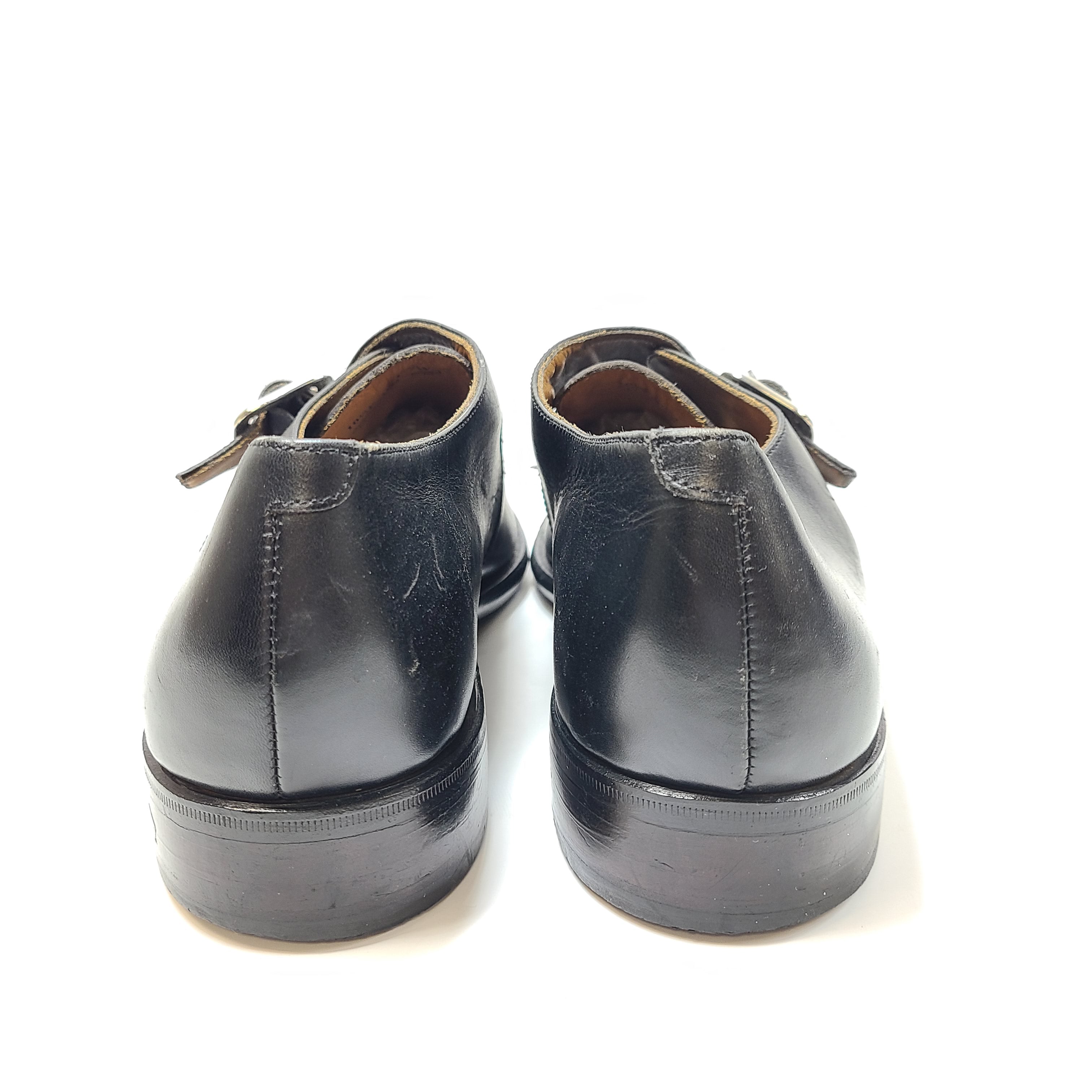 A black leather monk strap men's dress shoe in size 10.5F labeled Churchill.