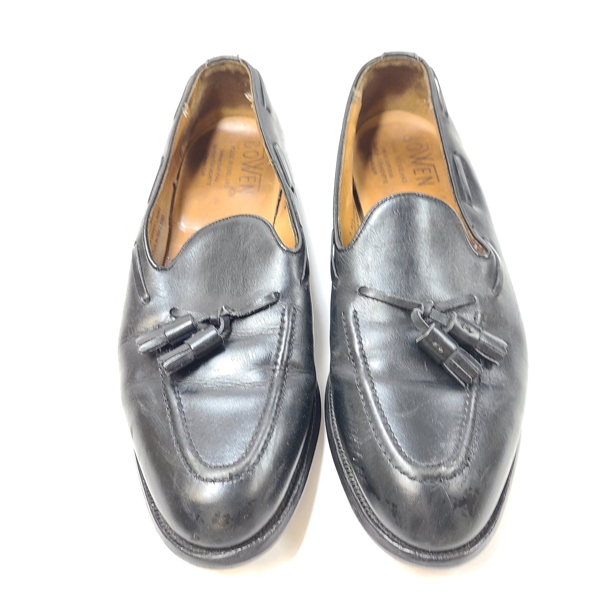 Black leather Bowen men's loafers with classic slip-on silhouette and low heel.