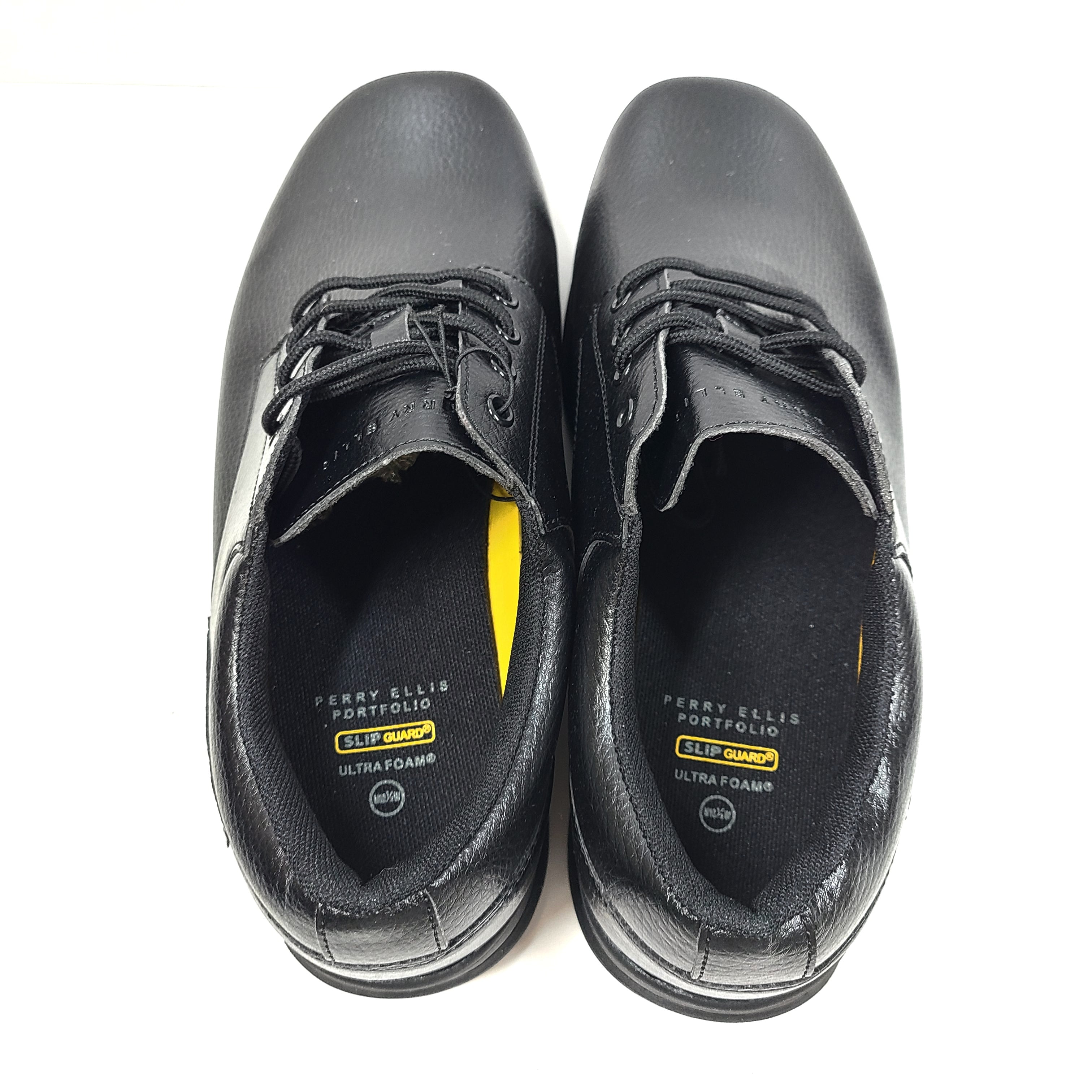 Black Perry Ellis Portfolio SG2 WIDE men's wide-fit shoes with cushioned insole and slip-resistant outsole.