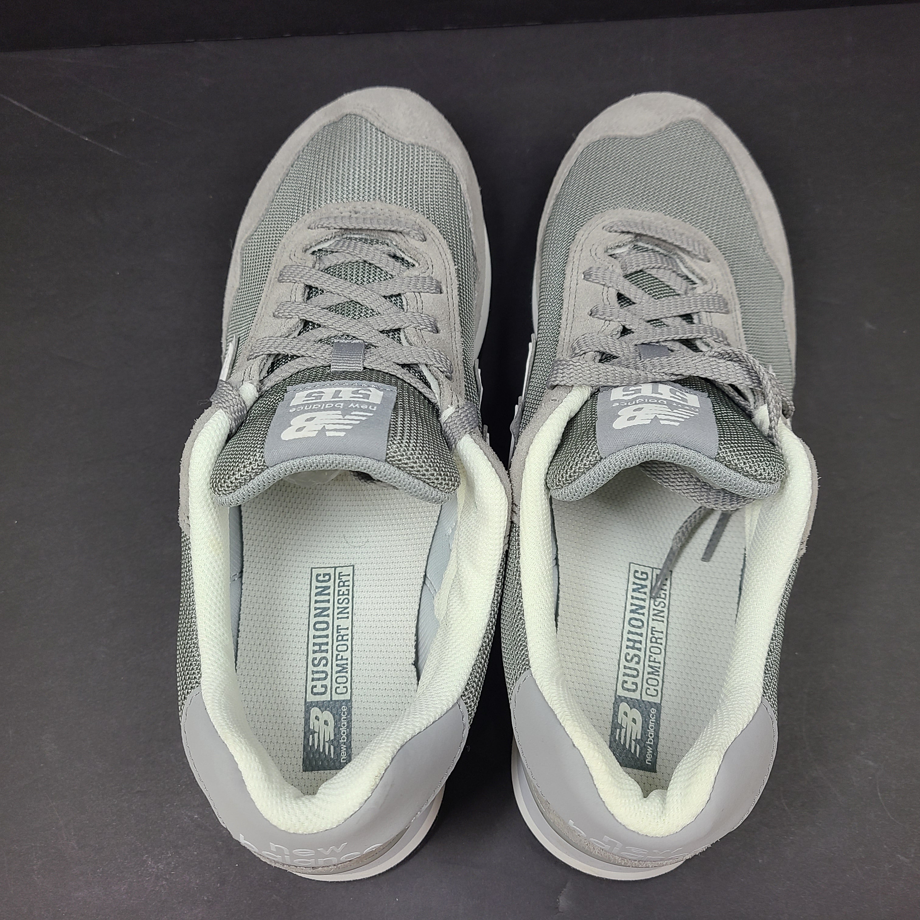 Gray New Balance ML515GRY men's sneaker in size 10 US with low-profile design and cushioned sole.