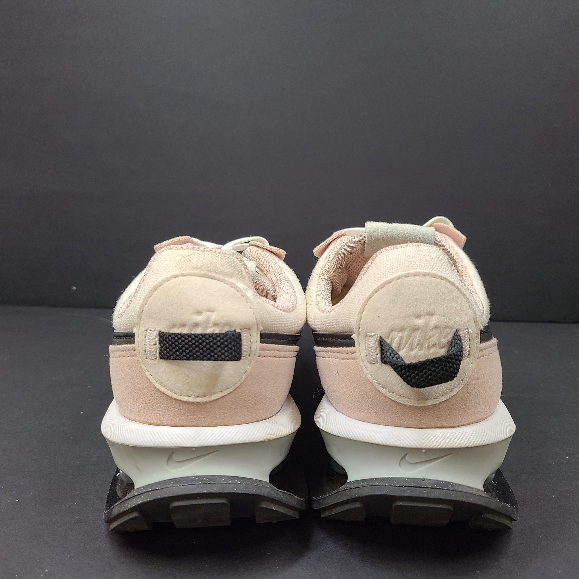Nike Air Max Pre-Day women's sneaker in beige and black, size US 7.5, model DM8259-600, with wear on the soles.