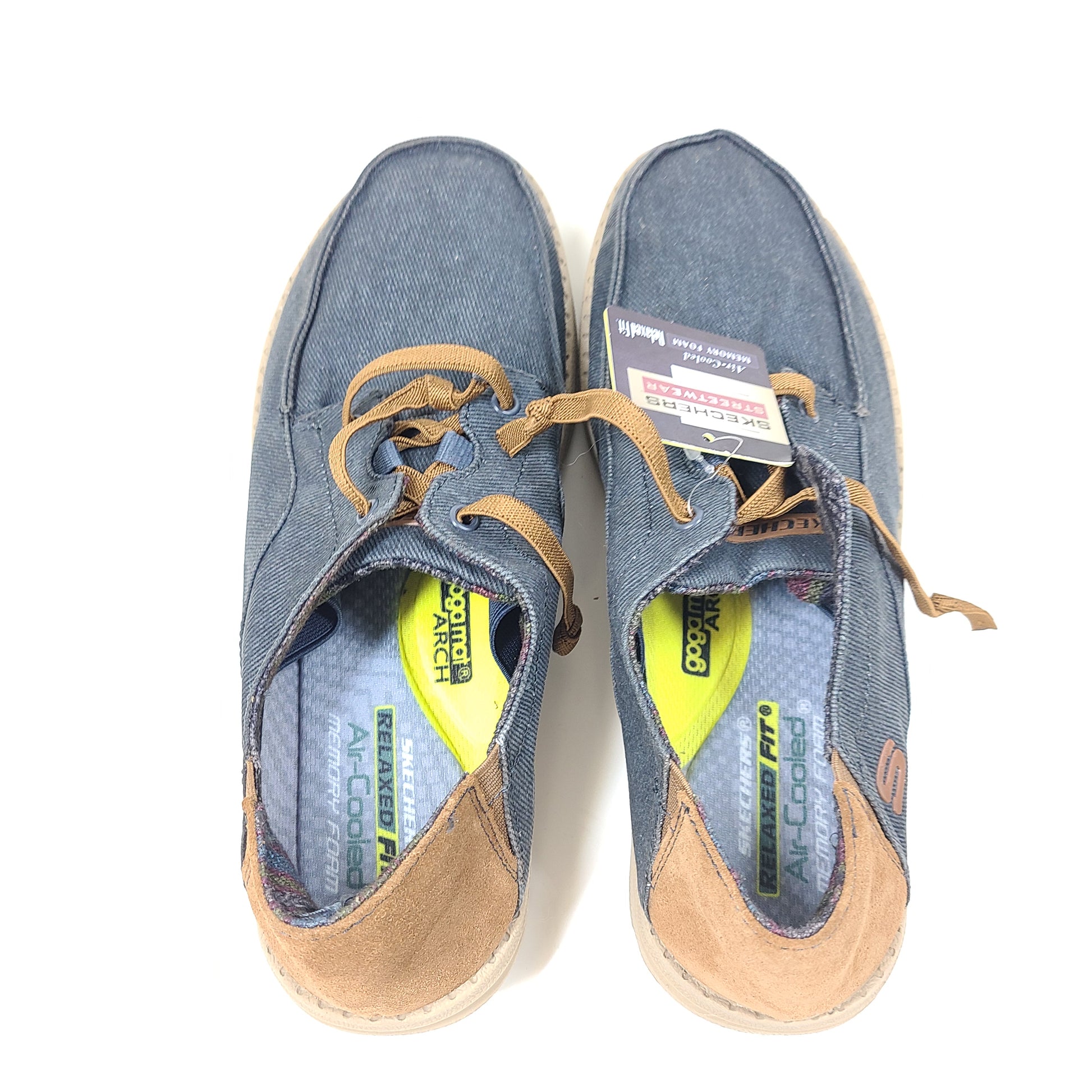 Navy and brown Skechers Melson Planon slip-on relaxed-fit shoes with cushioned memory foam insole.