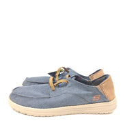Navy and brown Skechers Melson Planon slip-on relaxed-fit shoes with cushioned memory foam insole.