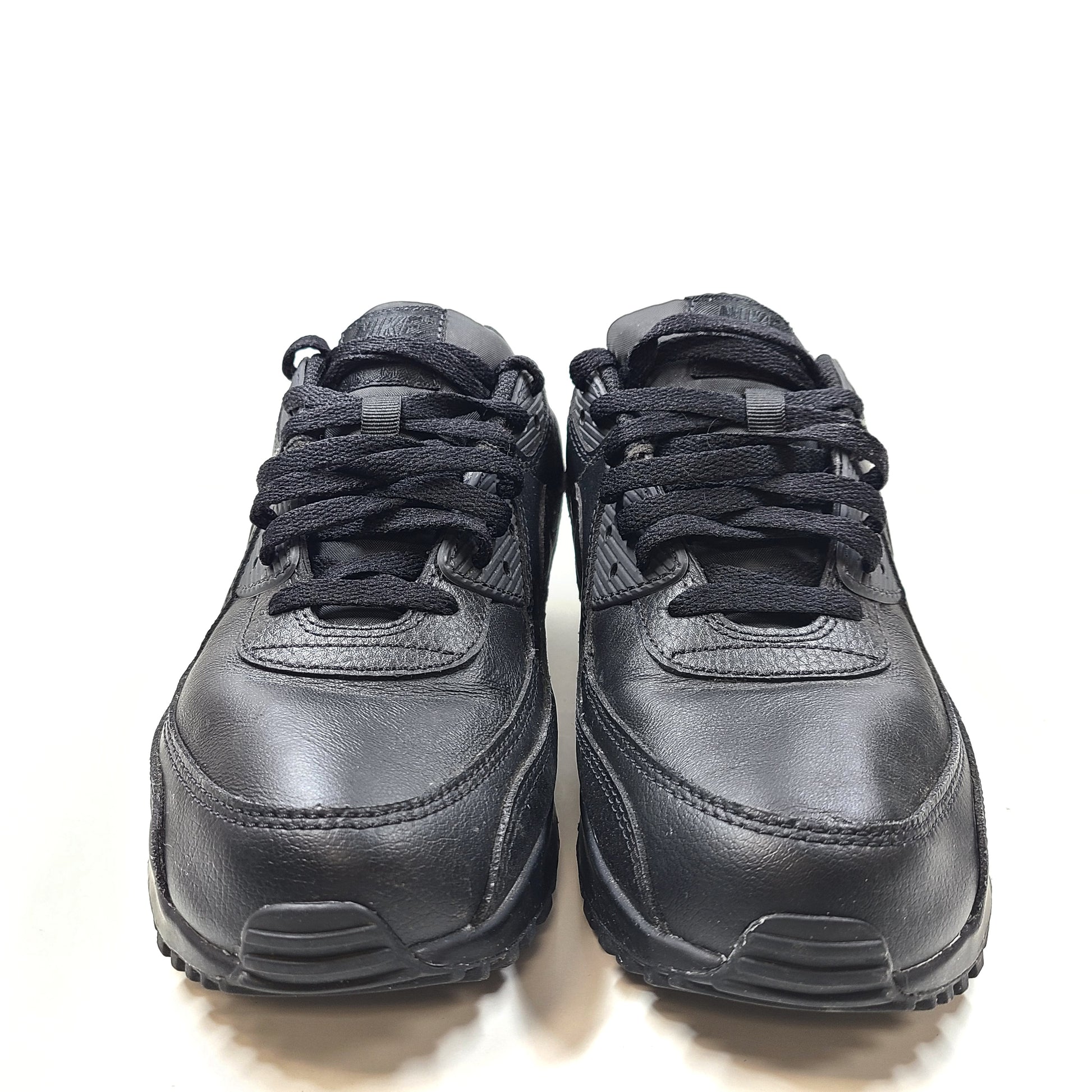 Black Nike Air Max 90 LTR leather sneakers in men's US 11 with Air cushioning and classic silhouette.