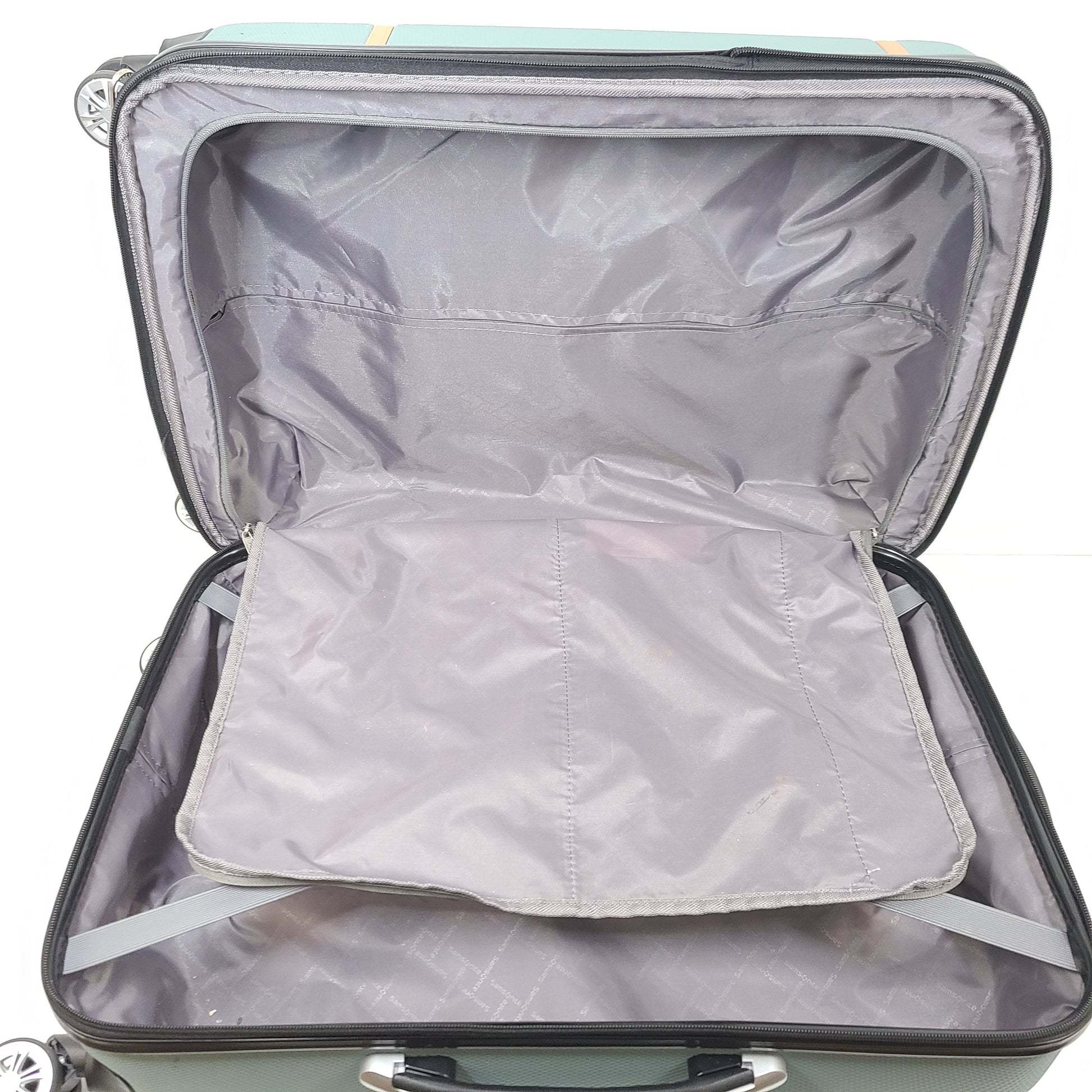 A light blue Samsonite medium suitcase with yellow accents and a front Samsonite logo.
