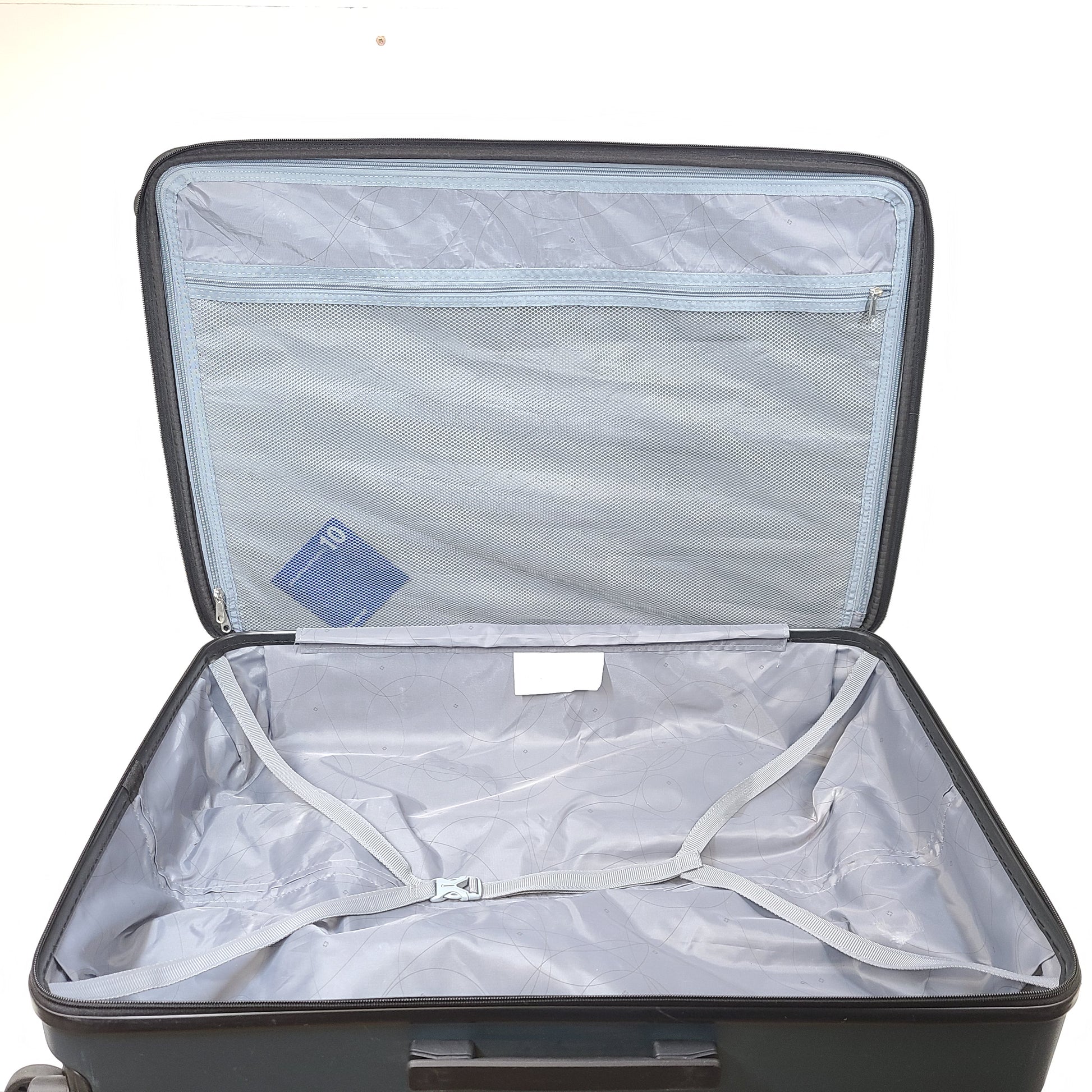A blue Samsonite suitcase with scuffs and scratches on the exterior and a clean, well-kept interior.