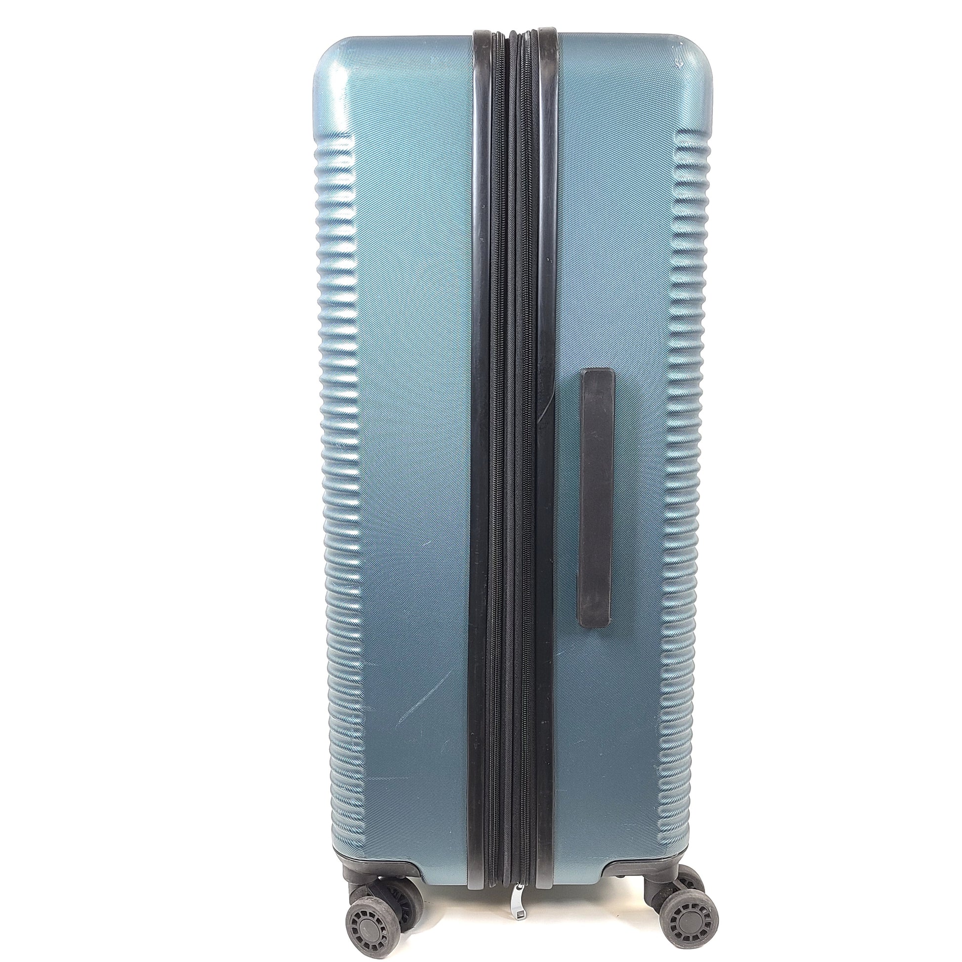 A blue Samsonite suitcase with scuffs and scratches on the exterior and a clean, well-kept interior.