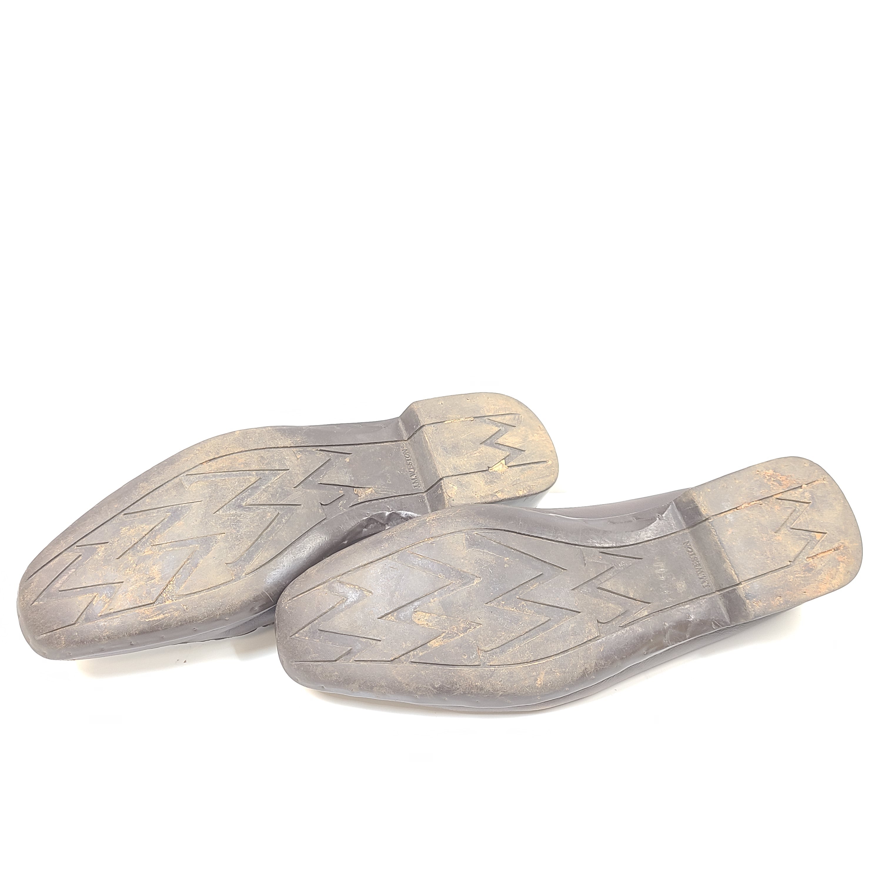 Brown leather Johnston & Murphy loafers in men's size 10.5 D with classic slip-on styling.