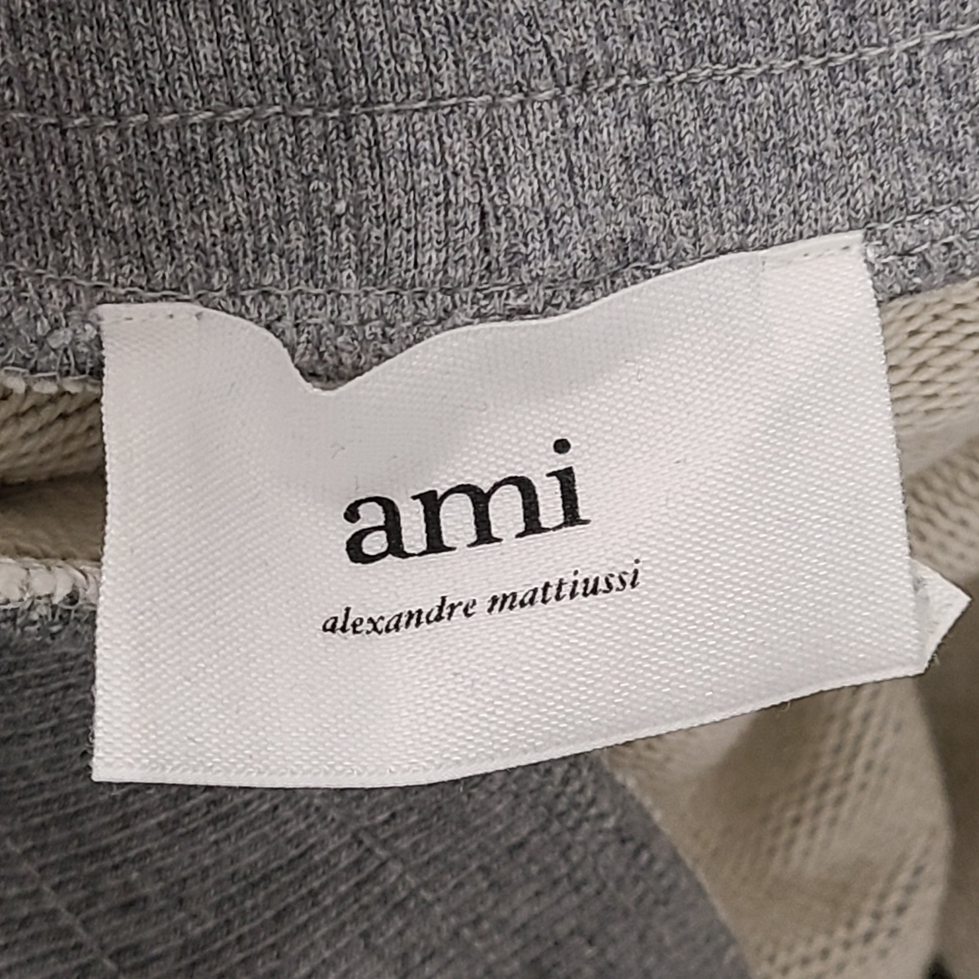 Grey and black AMI Alexandre Mattiussi shorts with a heart patch in organic cotton.