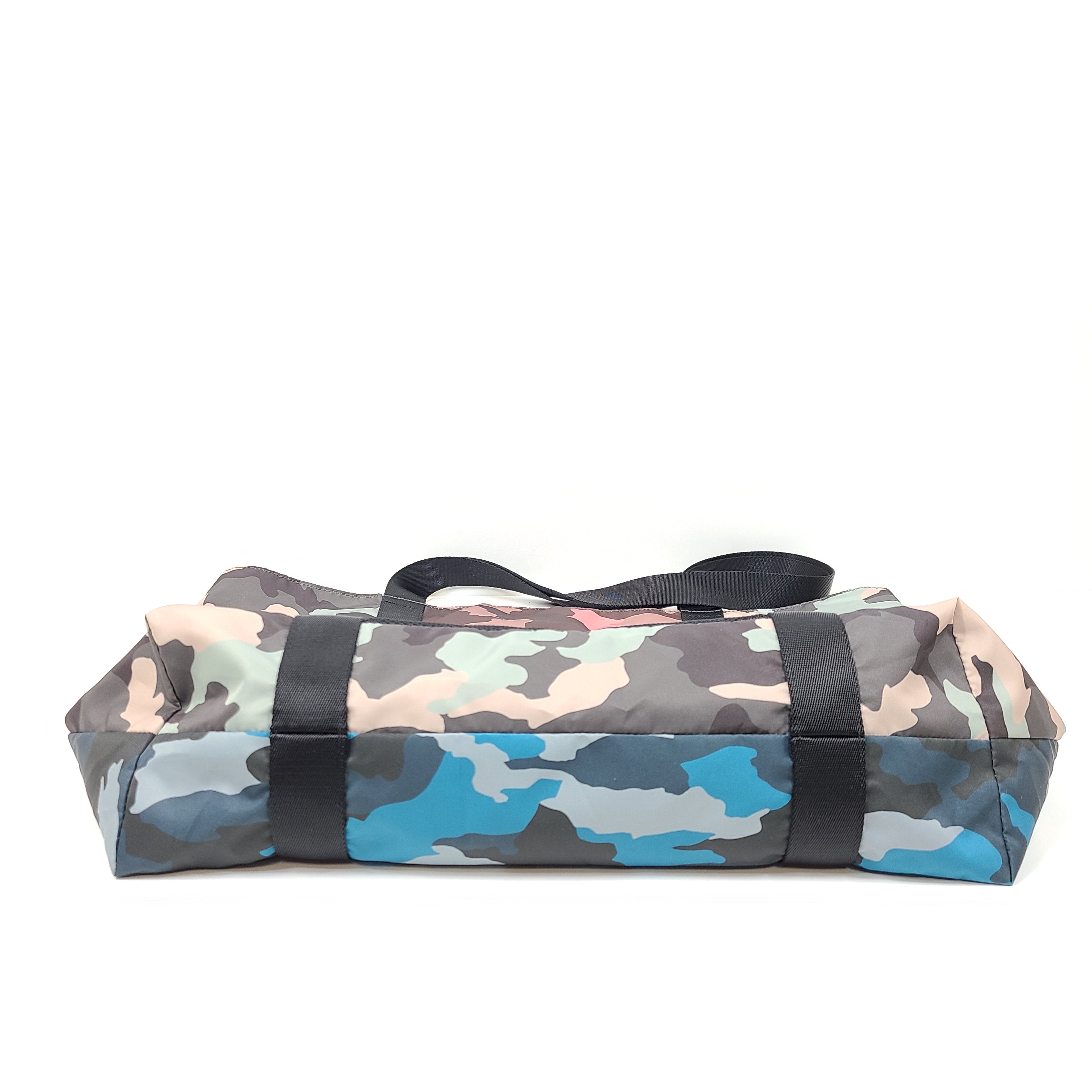 Multicolor Lululemon camouflage tote with pink, brown, green and blue panels and an internal label reading "items of importance".