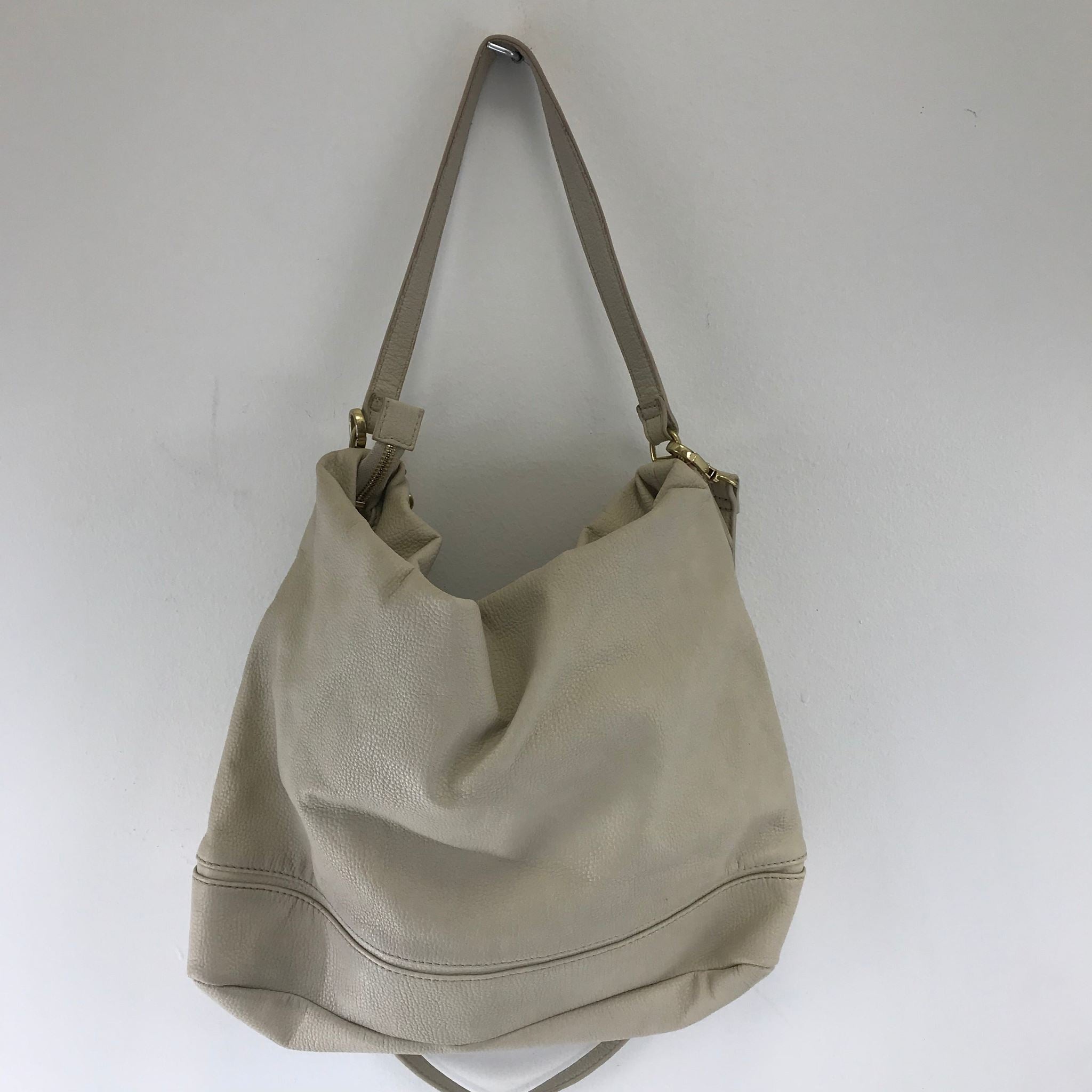 Tommy Hilfiger Bucket Hobo Shoulder Bag with Tassel and Detachable Strap Beige