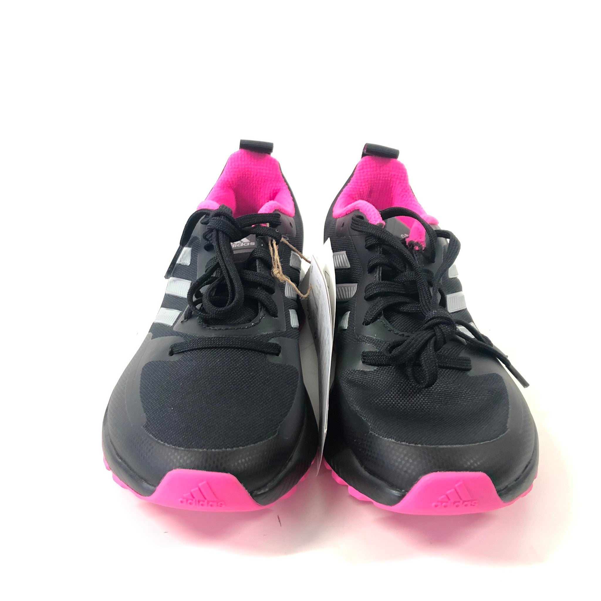 Black and pink Adidas sneakers on a white background