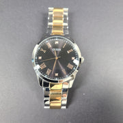 Guess Men's 'Elect' Gold and Silver Tone Stainless Steel Watch Roman Numerals