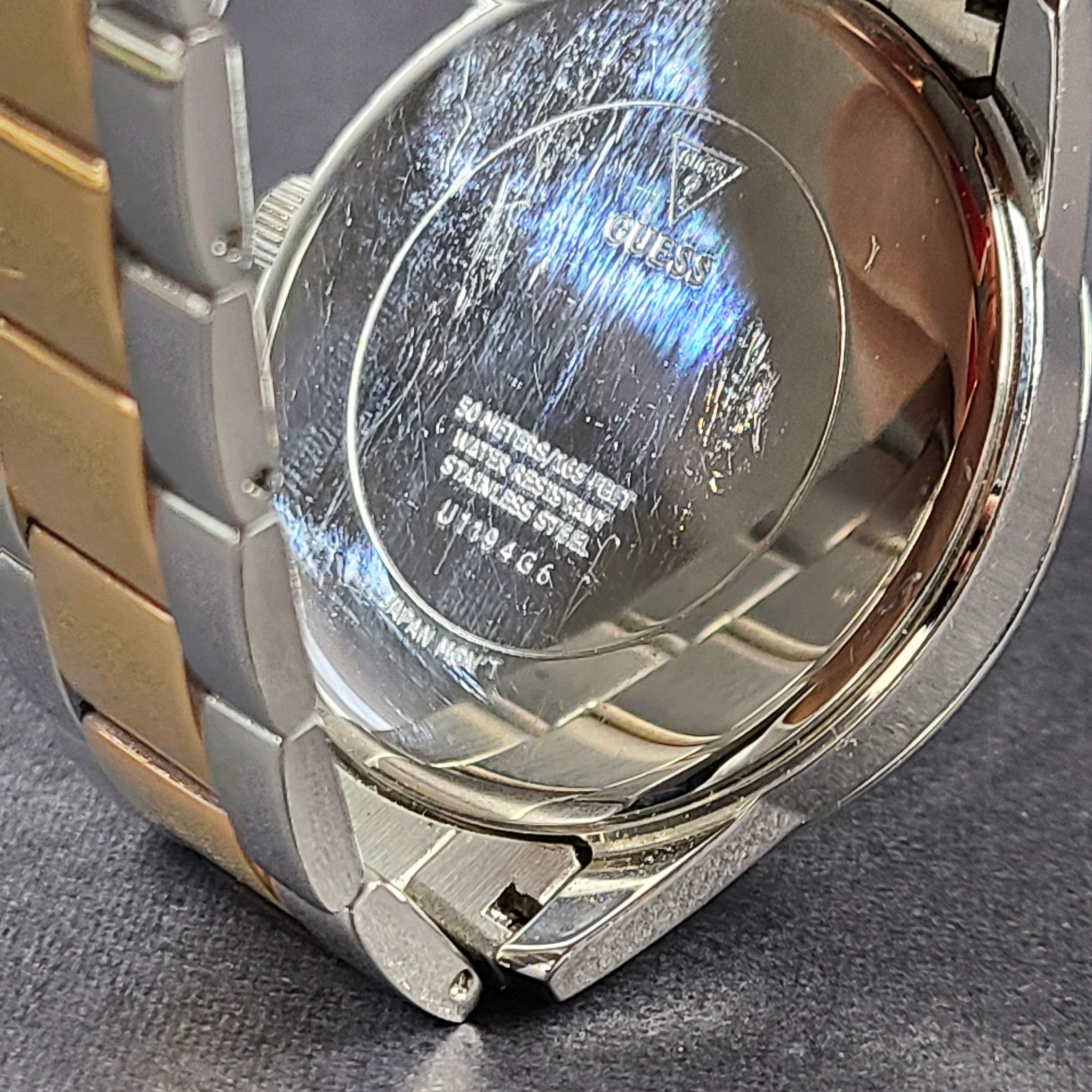 Guess Men's 'Elect' Gold and Silver Tone Stainless Steel Watch Roman Numerals