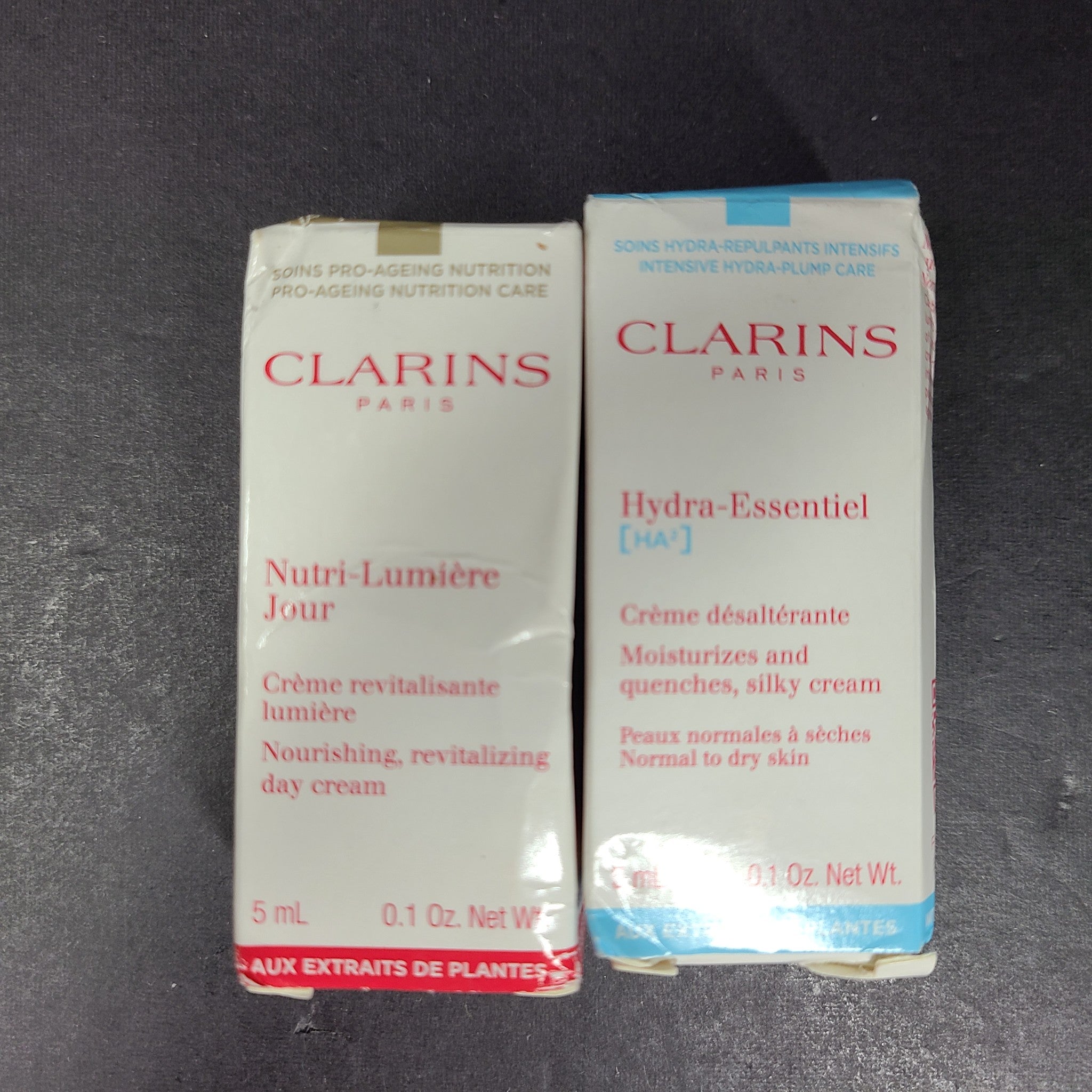 2 x 0.1oz Samples Clarins Hydra Essentiel & Nutri Lumiere Creams