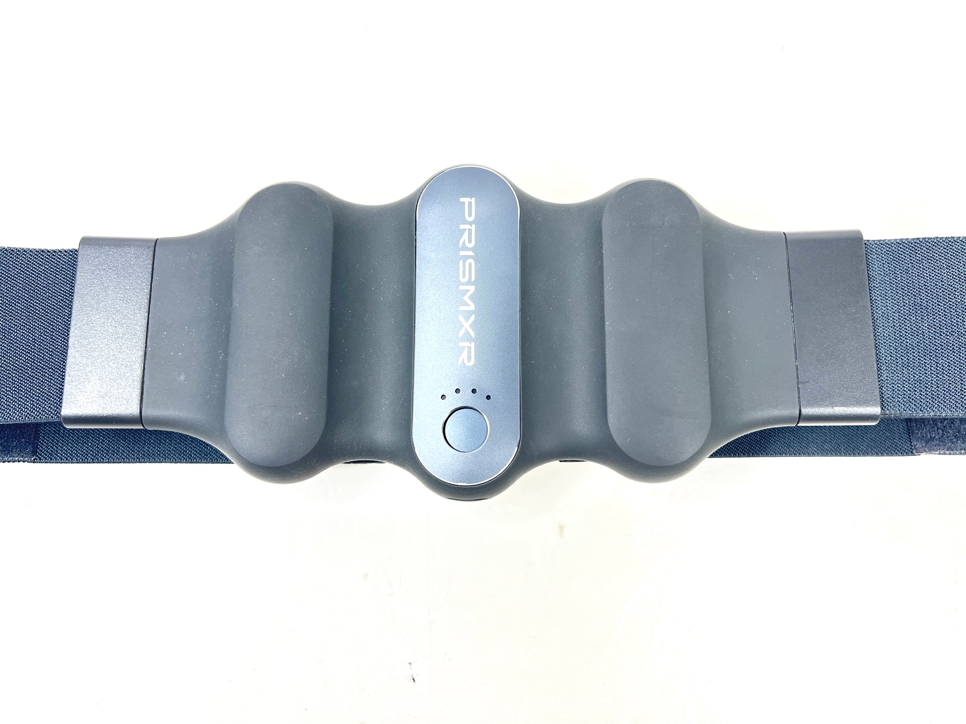 Blue PrismXR Carina W1 wearable haptic belt with contoured padding, power button, and USB-C charging port
