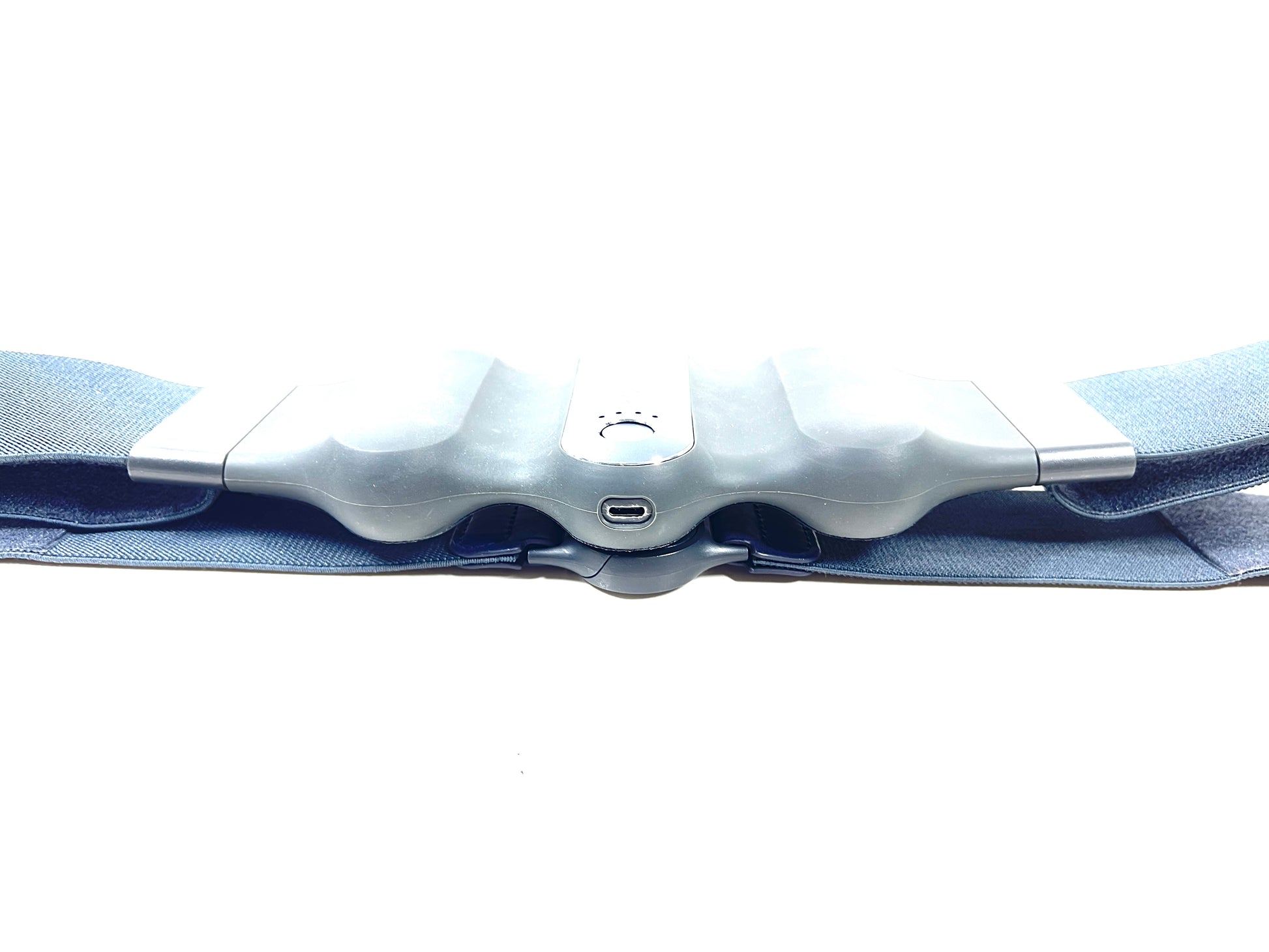 Blue PrismXR Carina W1 wearable haptic belt with contoured padding, power button, and USB-C charging port