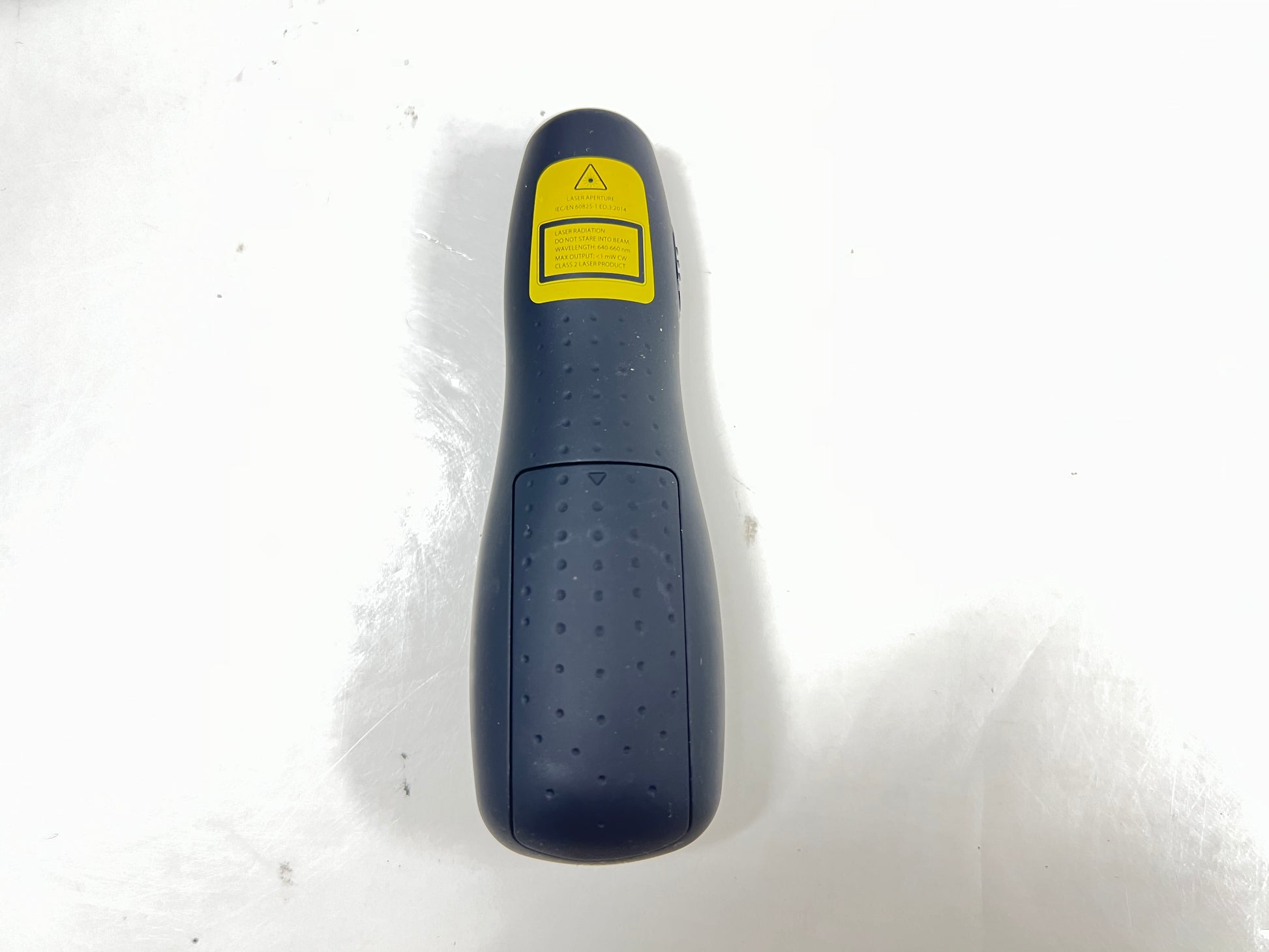 Black Logitech R400 wireless presentation remote with laser pointer and slideshow controls shown from multiple angles.