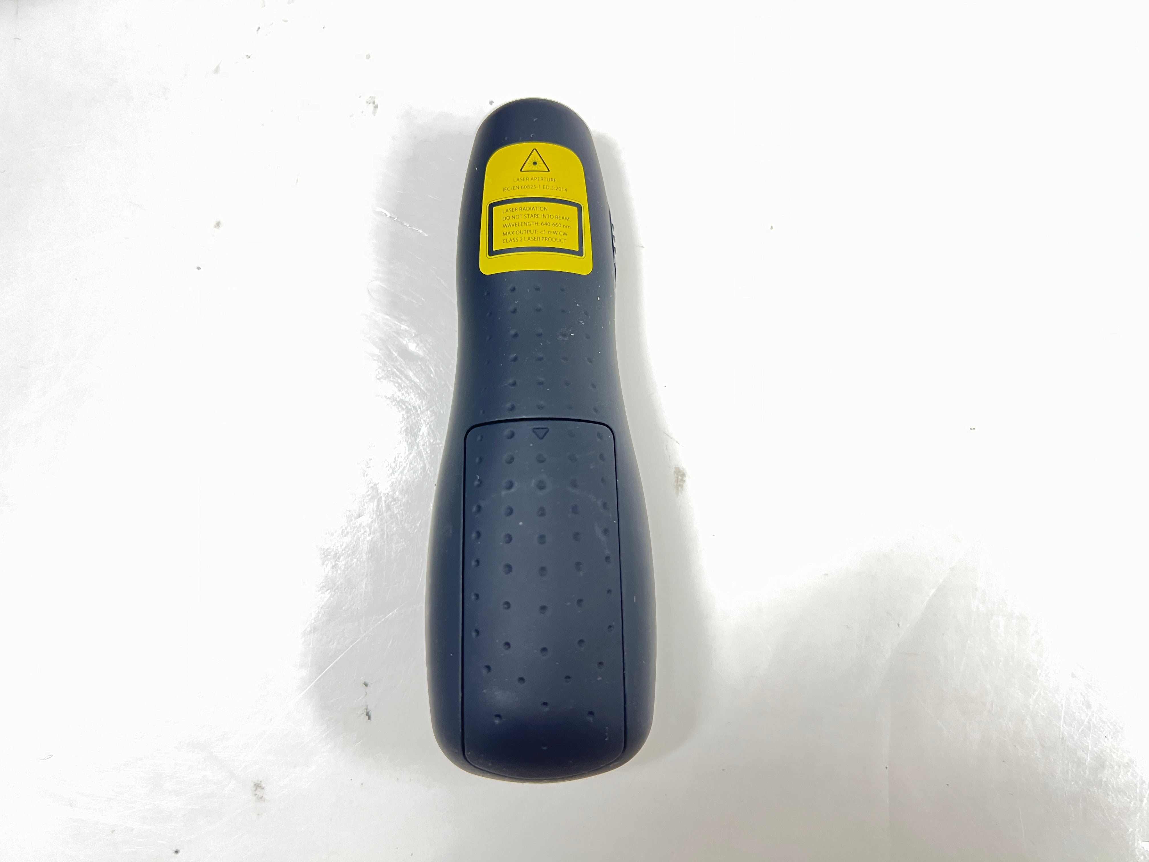 Black Logitech R400 wireless presentation remote with laser pointer and slideshow controls shown from multiple angles.