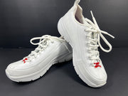 A pair of white Skechers Arch Fit women's sneakers
