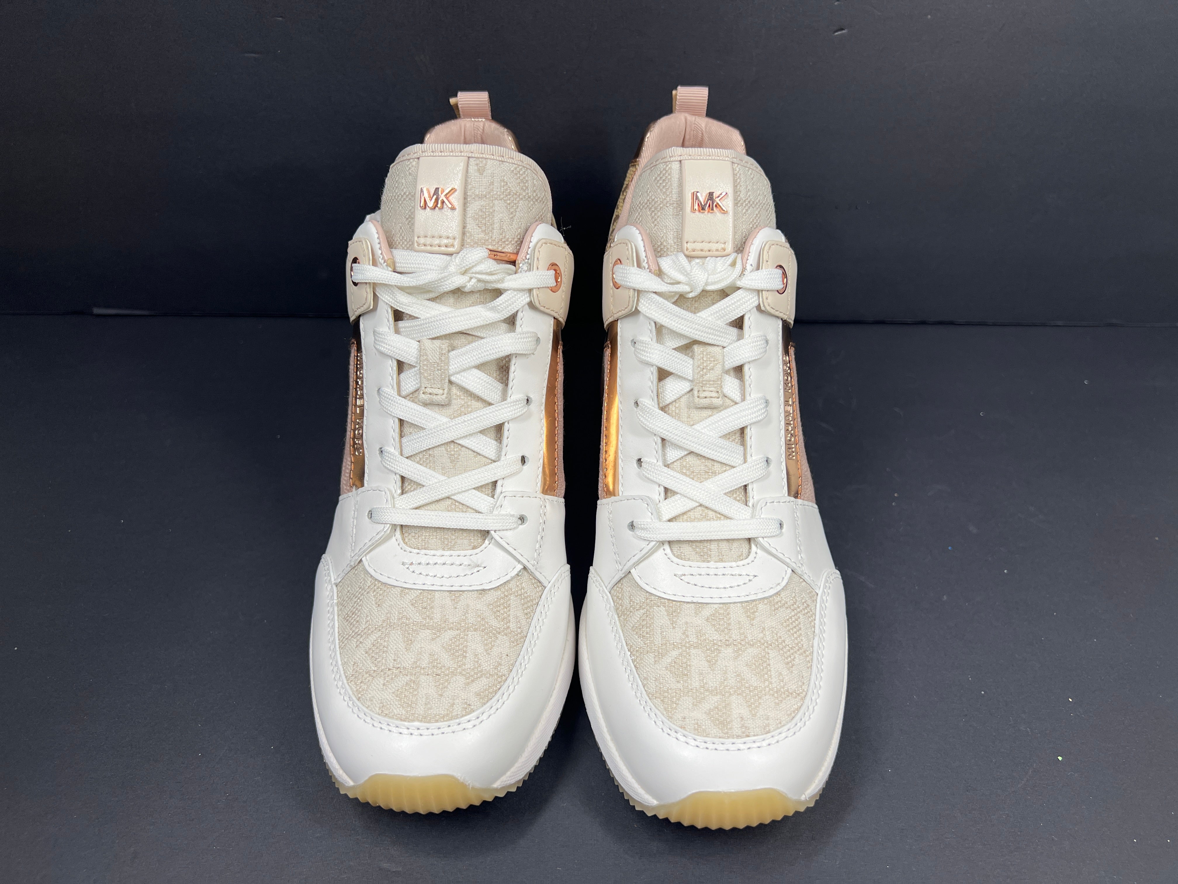 A pair of Men's Michael Kors shoes in natural color and size 8.5M