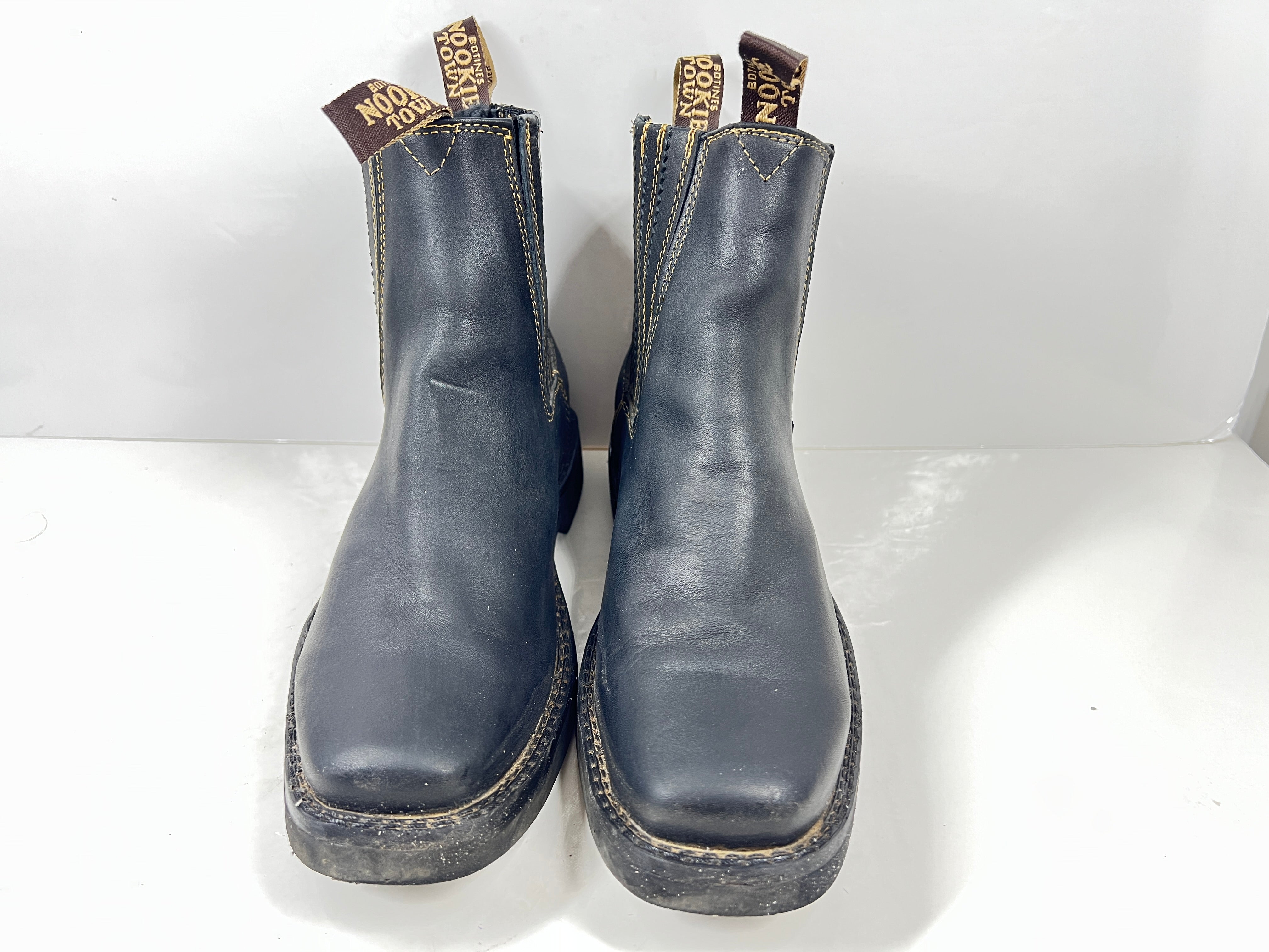 A pair of black leather women's boots by Nookie Town.