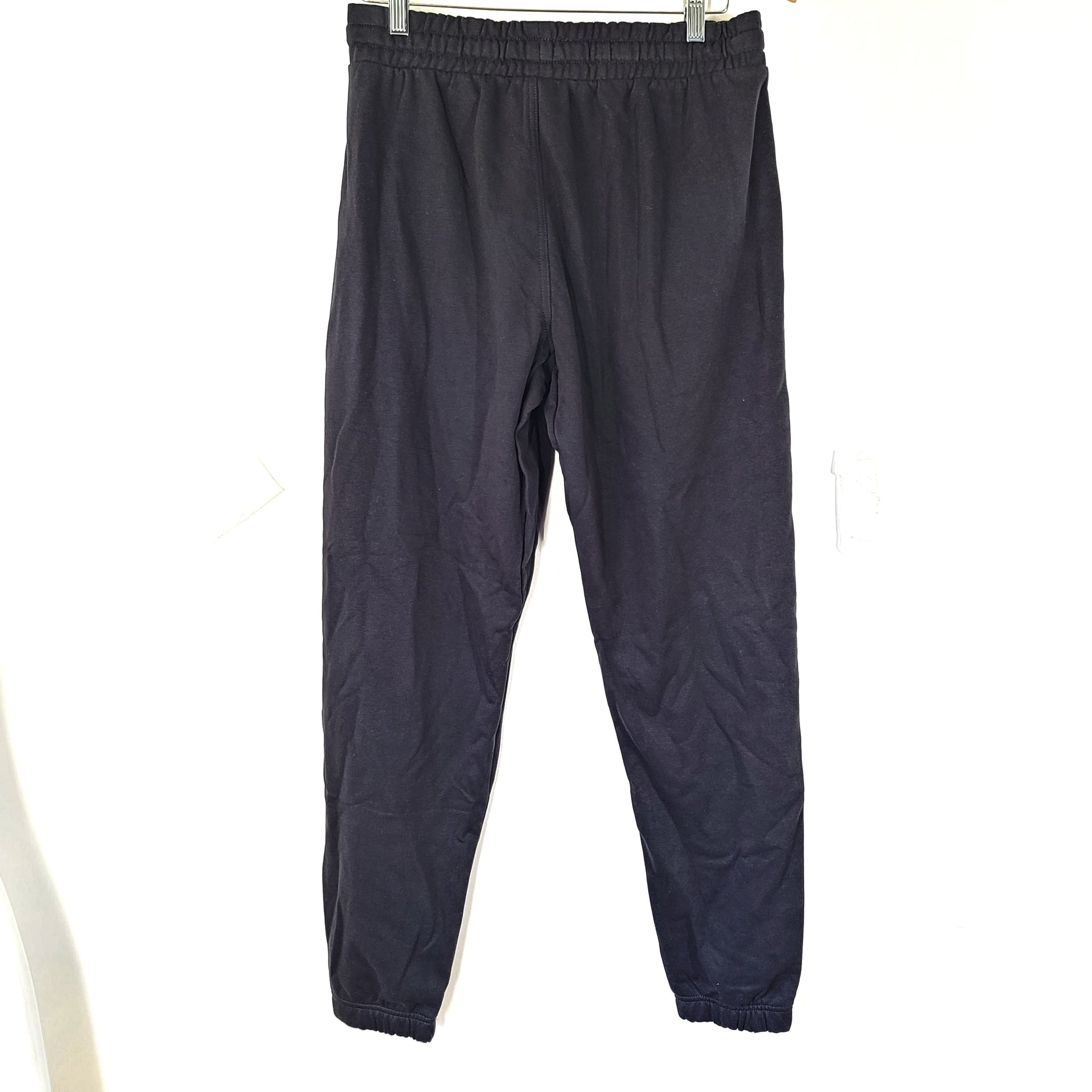 A pair of black oversized joggers by Gymshark.