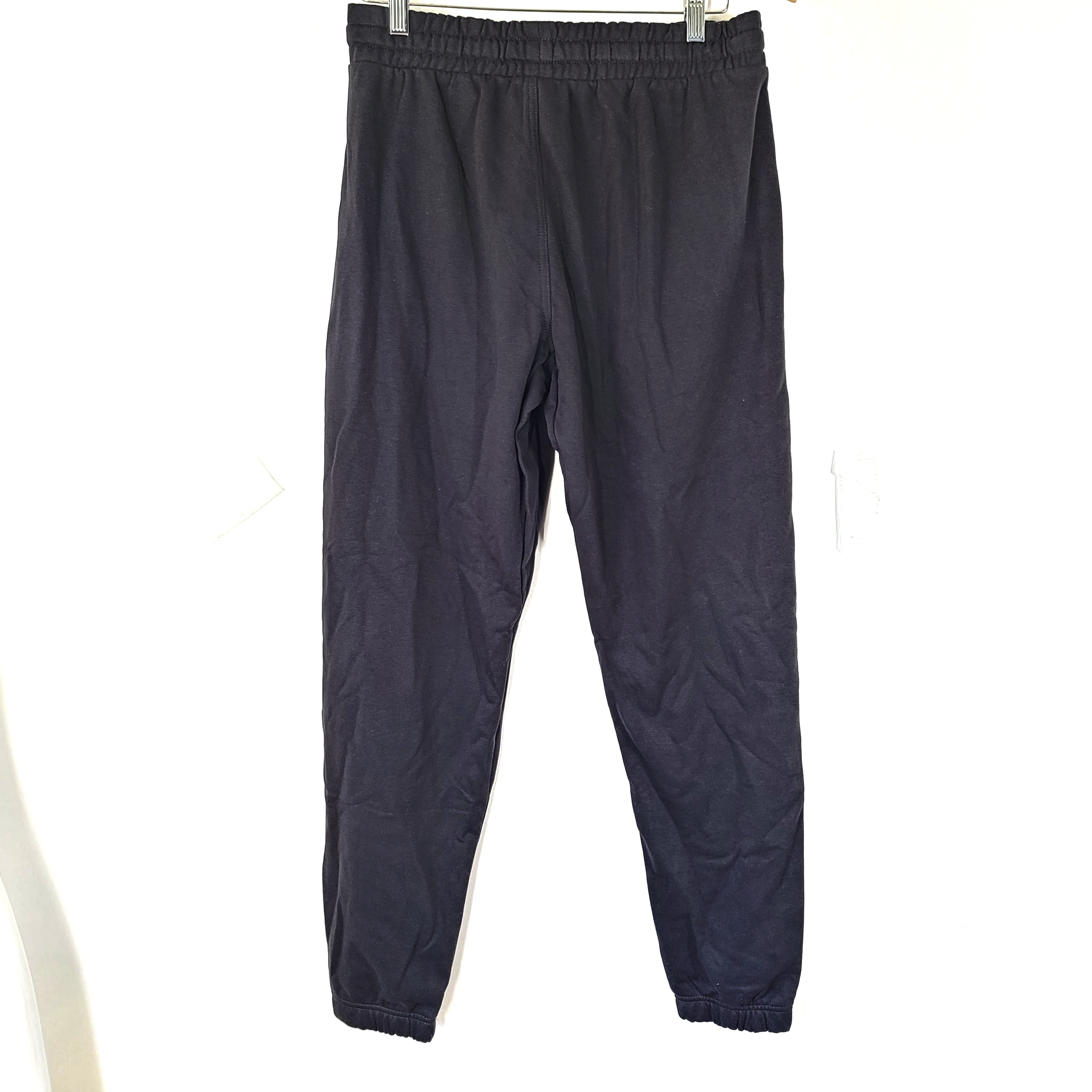 A pair of black oversized joggers by Gymshark.