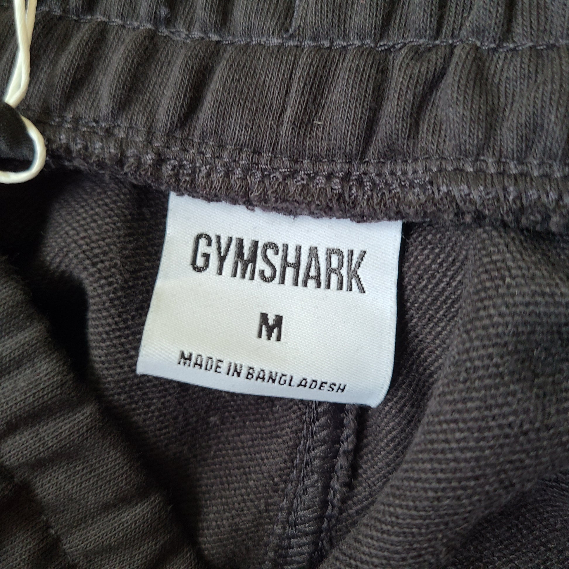 A pair of black oversized joggers by Gymshark.