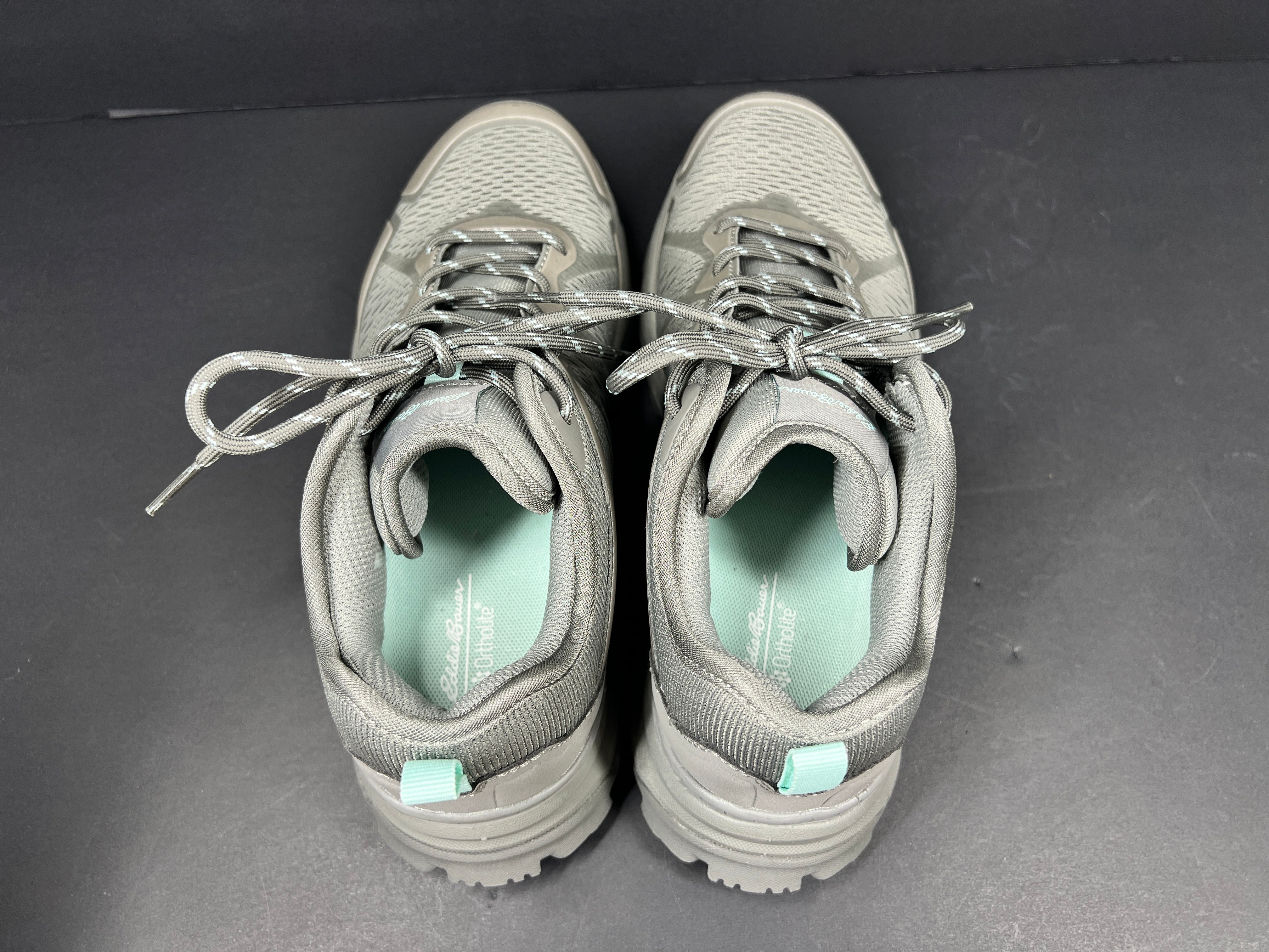 A pair of women's trail shoes by Eddie Bauer in size 7