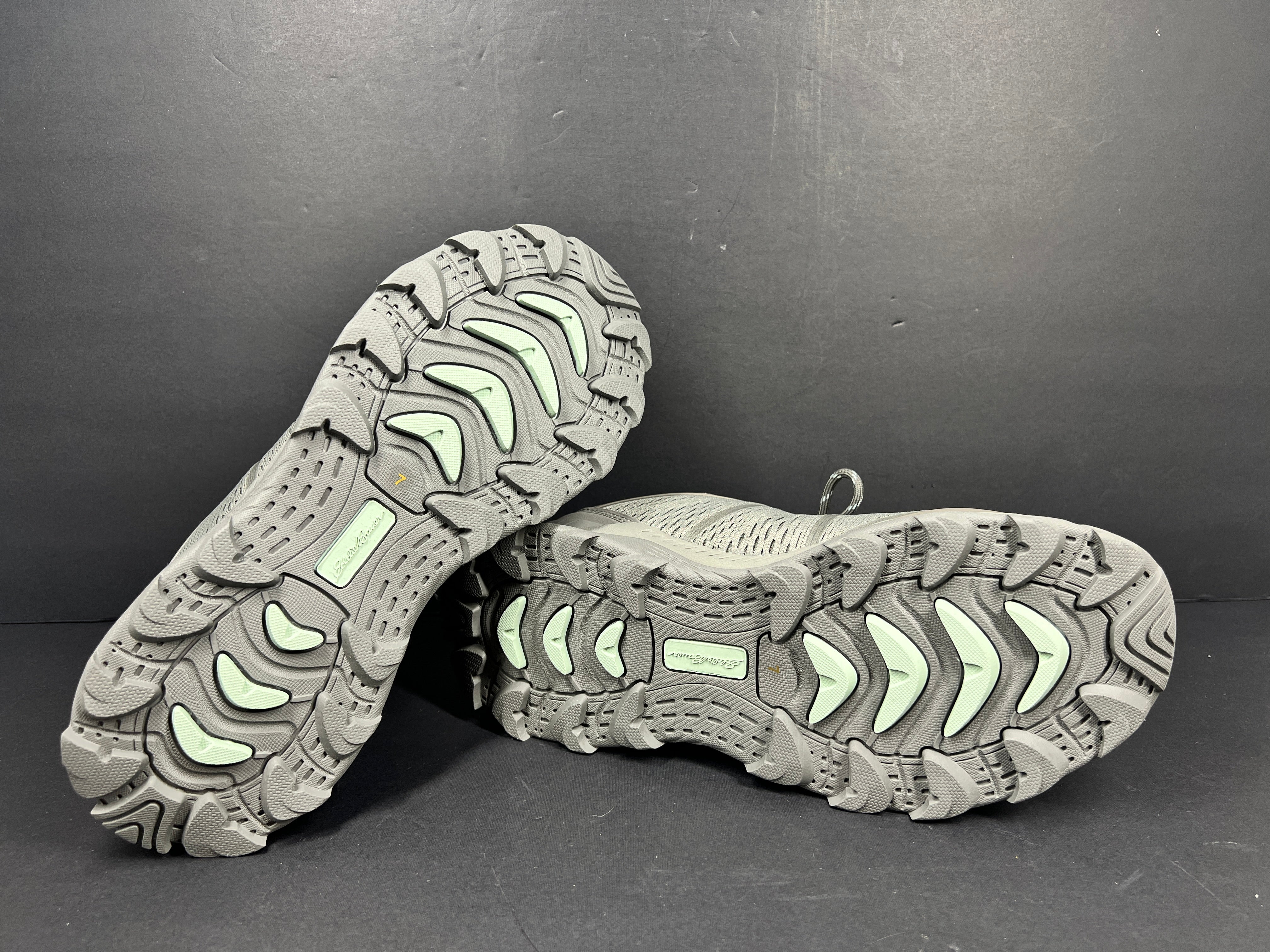 A pair of women's trail shoes by Eddie Bauer in size 7
