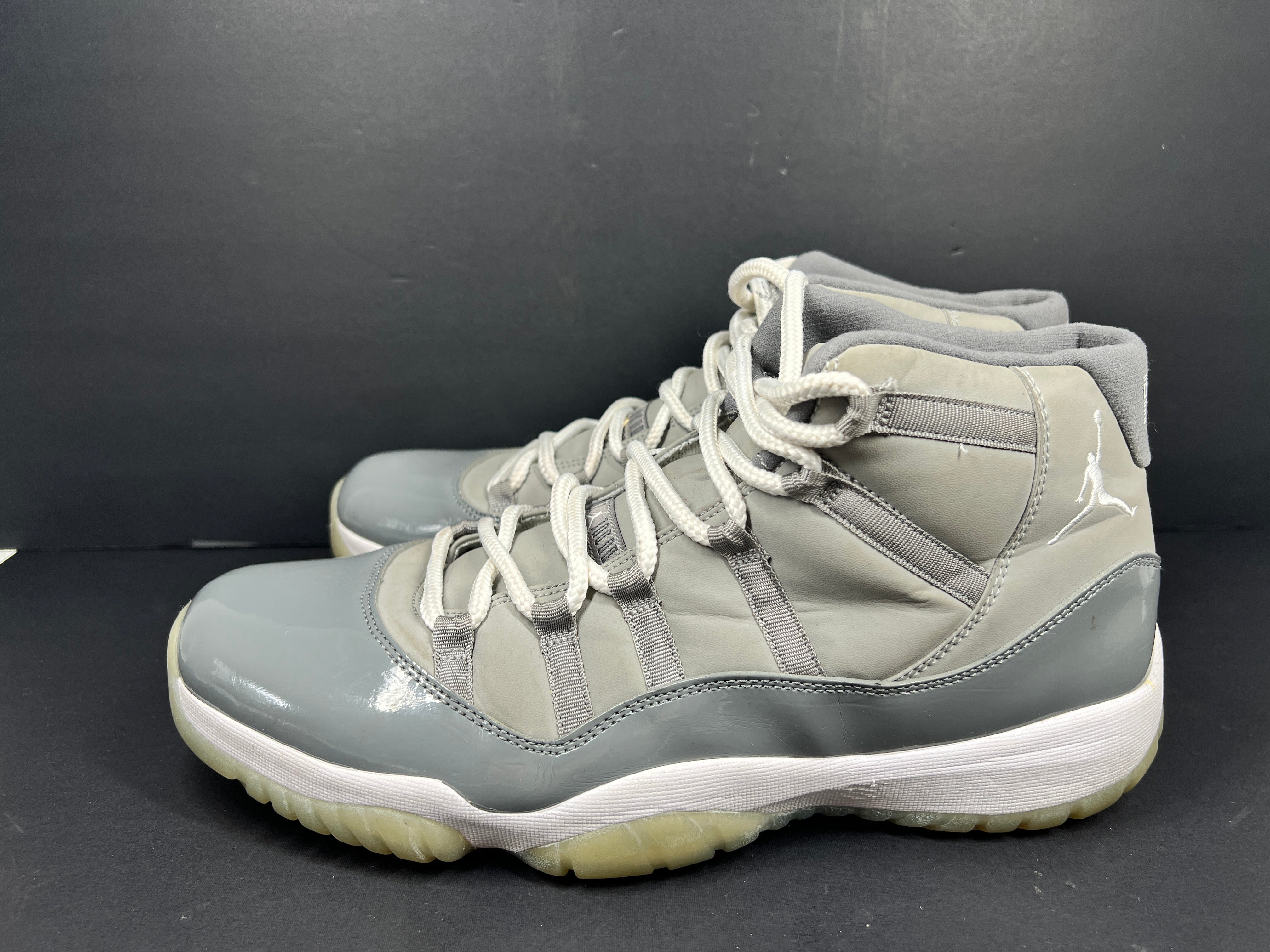 A pair of Nike Air Jordan 11 Retro "Cool Grey" Men's Basketball Shoes