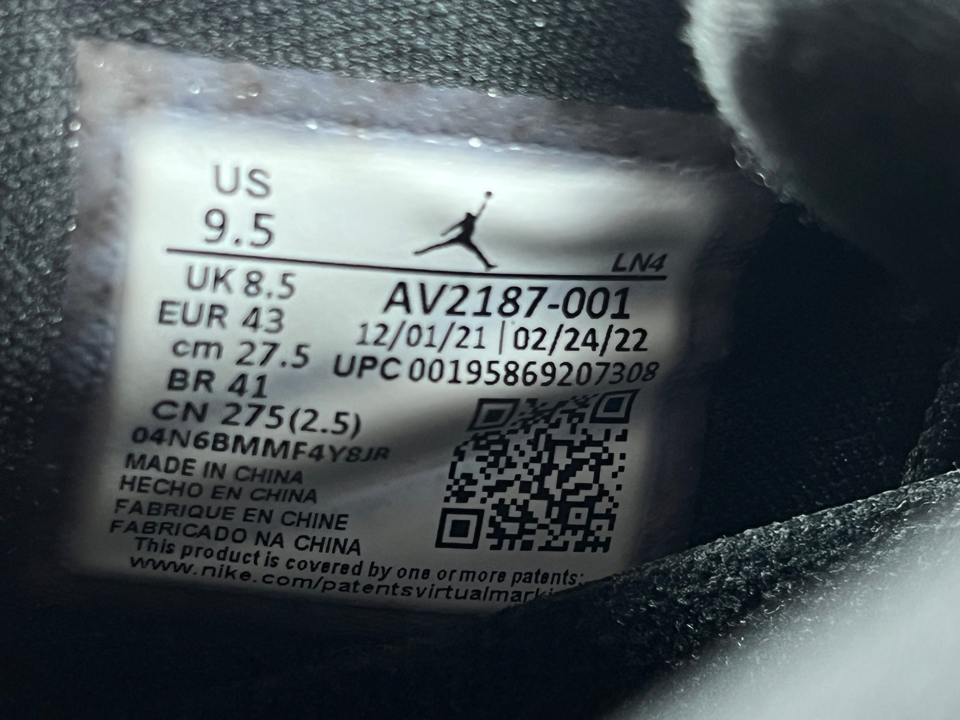 A pair of black Nike Air Jordan Retro 11 Low AV2187-001 sneakers.