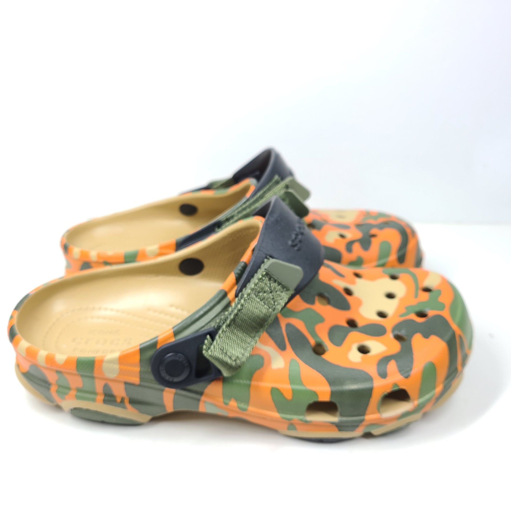 A pair of camouflage Crocs Classic clogs for men and women.