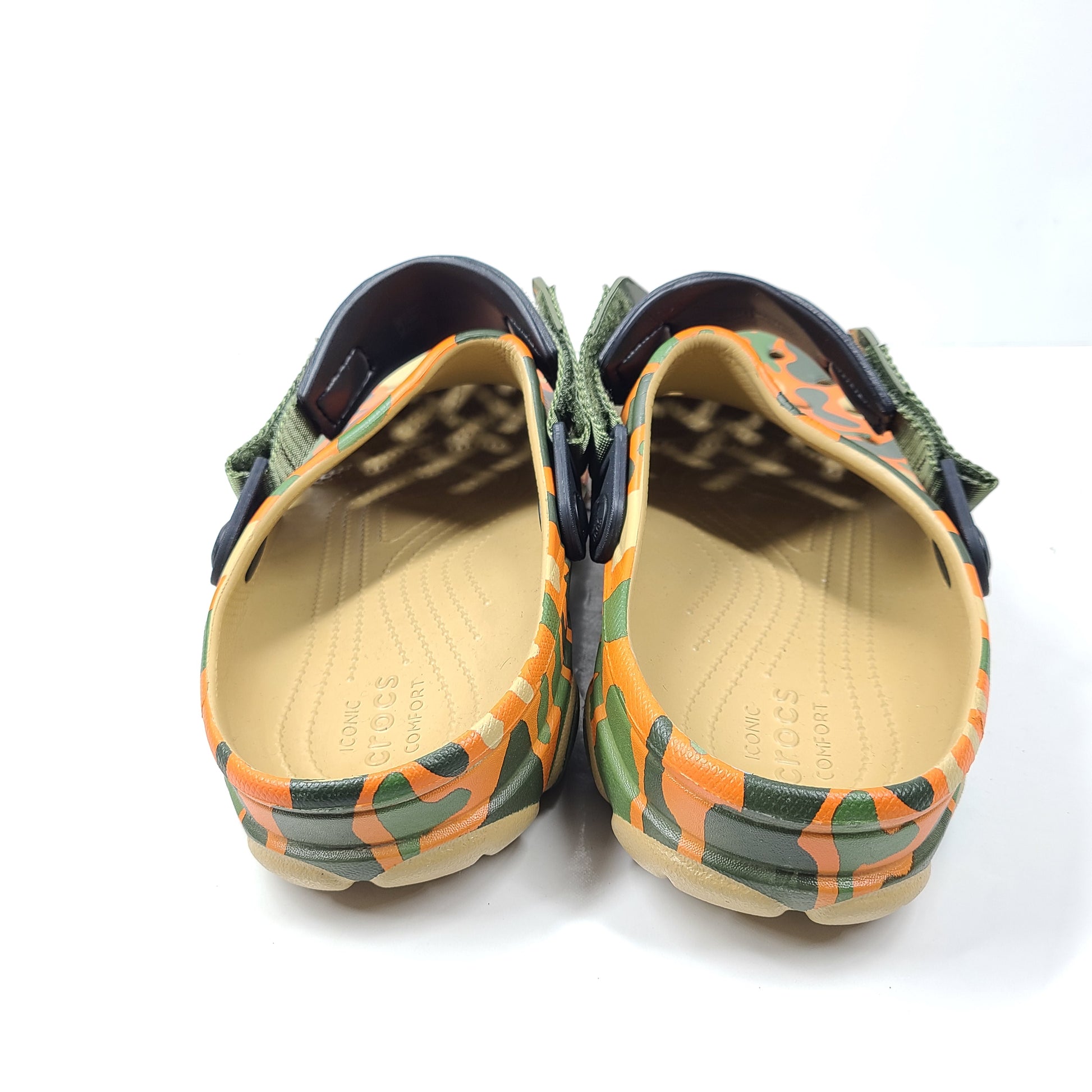 A pair of camouflage Crocs Classic clogs for men and women.